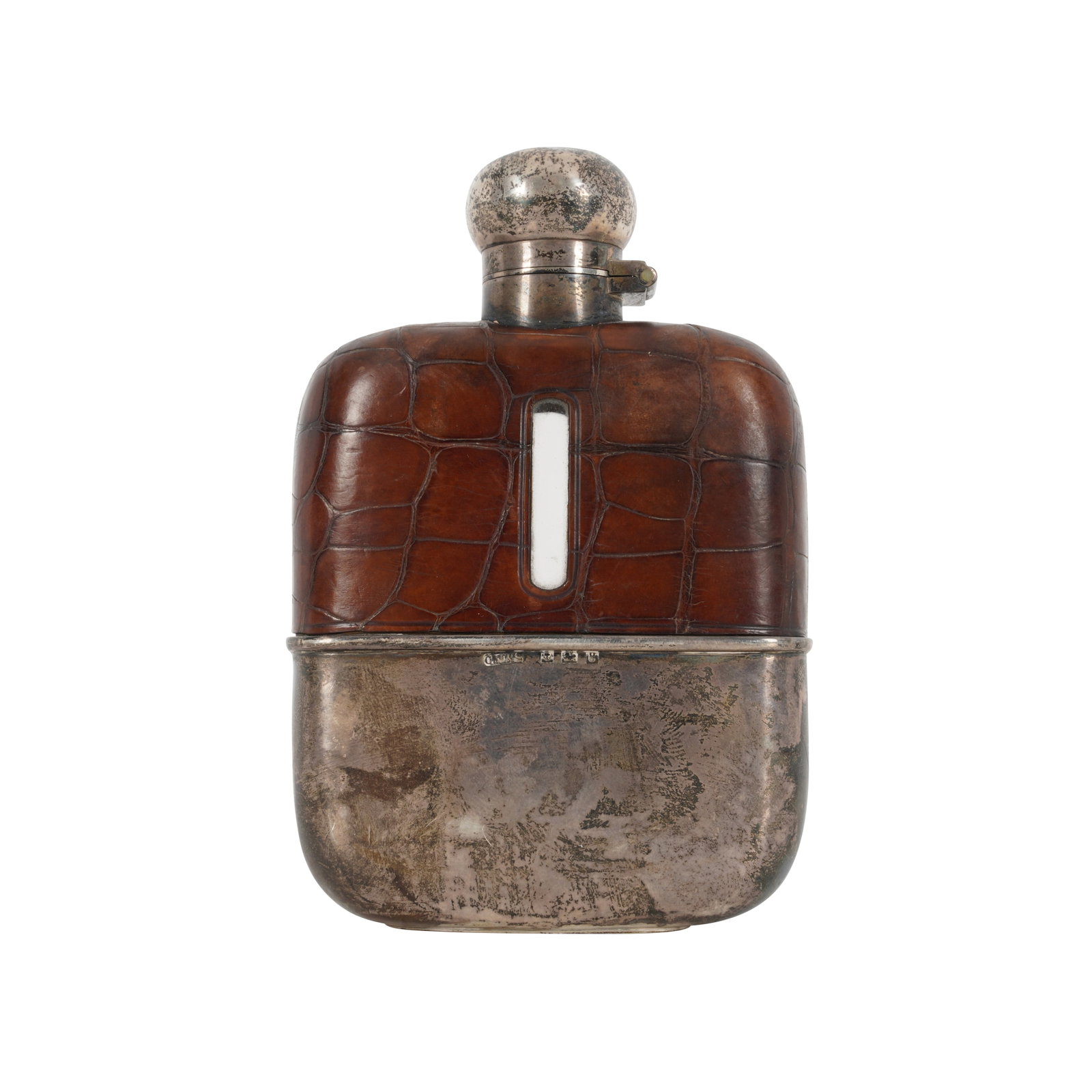 Birmingham 1906 by Charles Westwood and Sons An Edwardian sterling silver mounted spirit or hip flas: Birmingham 1906 by Charles Westwood and Sons An Edwardian sterling silver mounted spirit or hip flask With alligator mount. Clear glass. Length -12.1 cm / 4.75 inches Weight -50 grams / 1.61 ozt