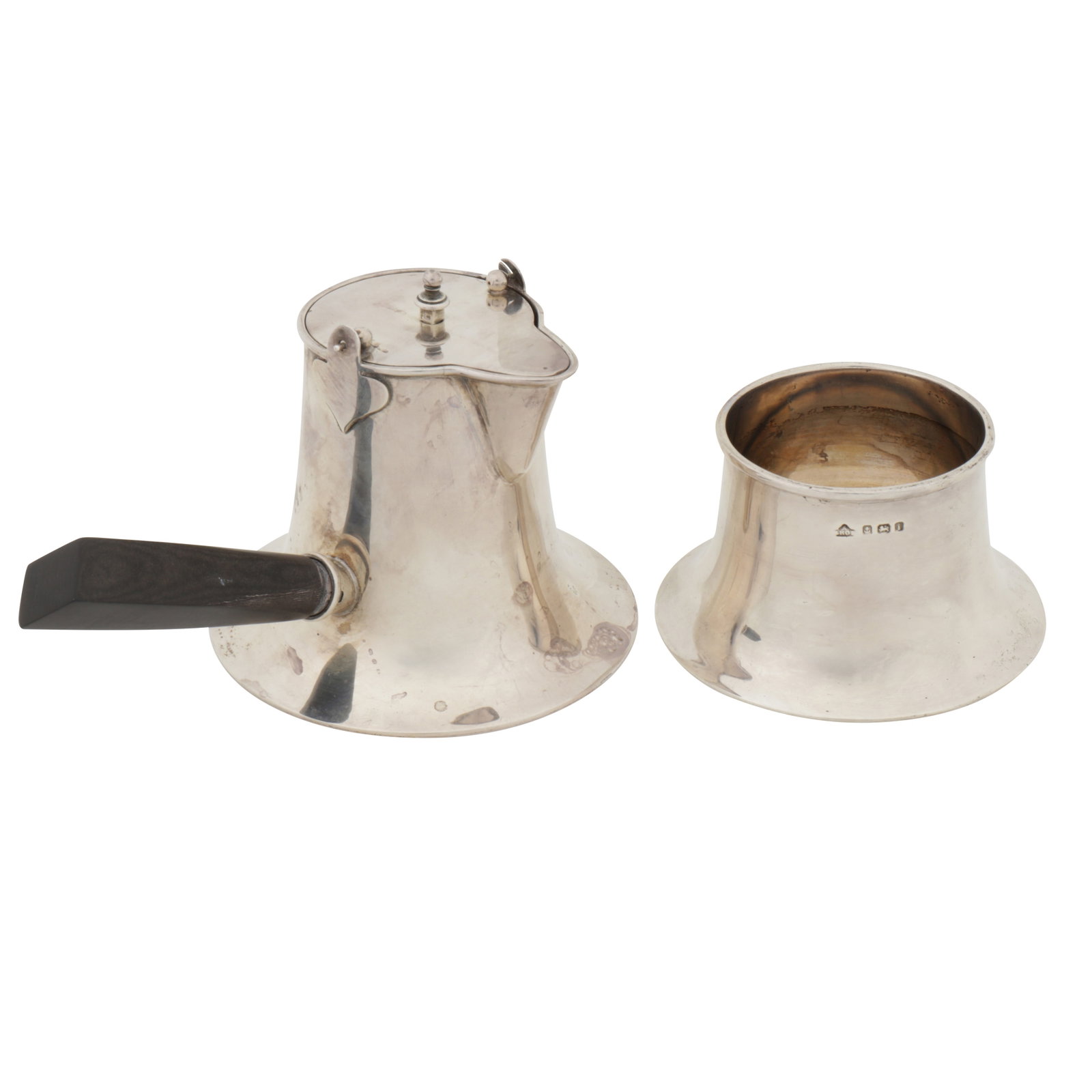 Birmingham 1908 by Adie Brothers An Edwardian sterling silver part- café au lait set: Birmingham 1908 by Adie Brothers An Edwardian sterling silver part- café au lait set Sugar bowl and hot milk pot, each of capstan form. (2) Weight – 316 grams / 10.16 ozt
