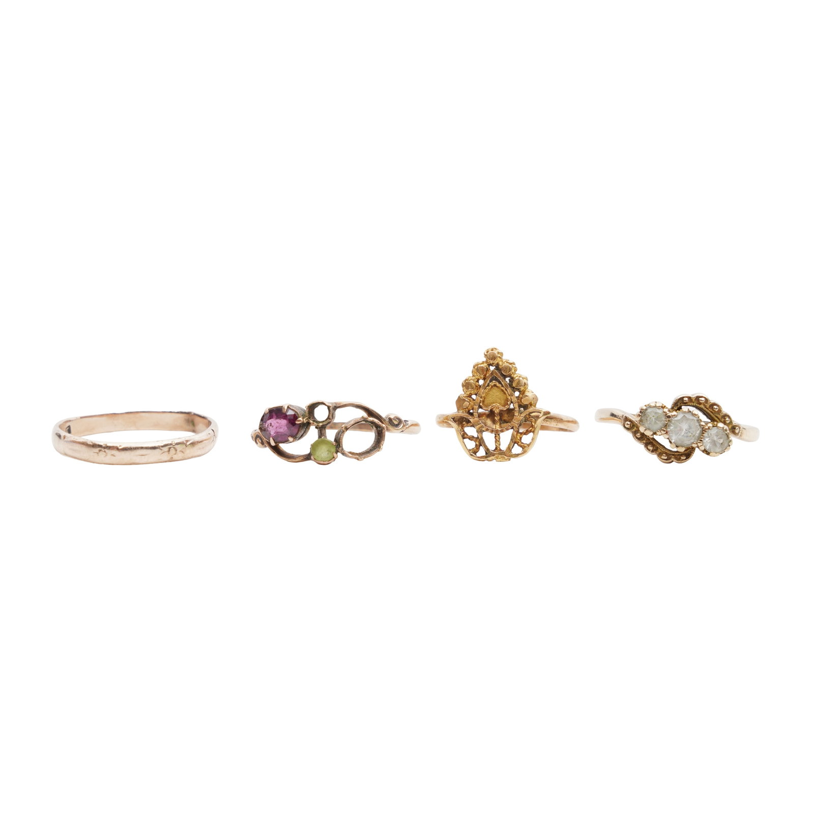 Four rings Yellow metal: Four rings Yellow metal All set in yellow metal, one hallmarked for 9 carat gold; one stamped 9ct; two unmarked; stones deficient, various sizes (4)