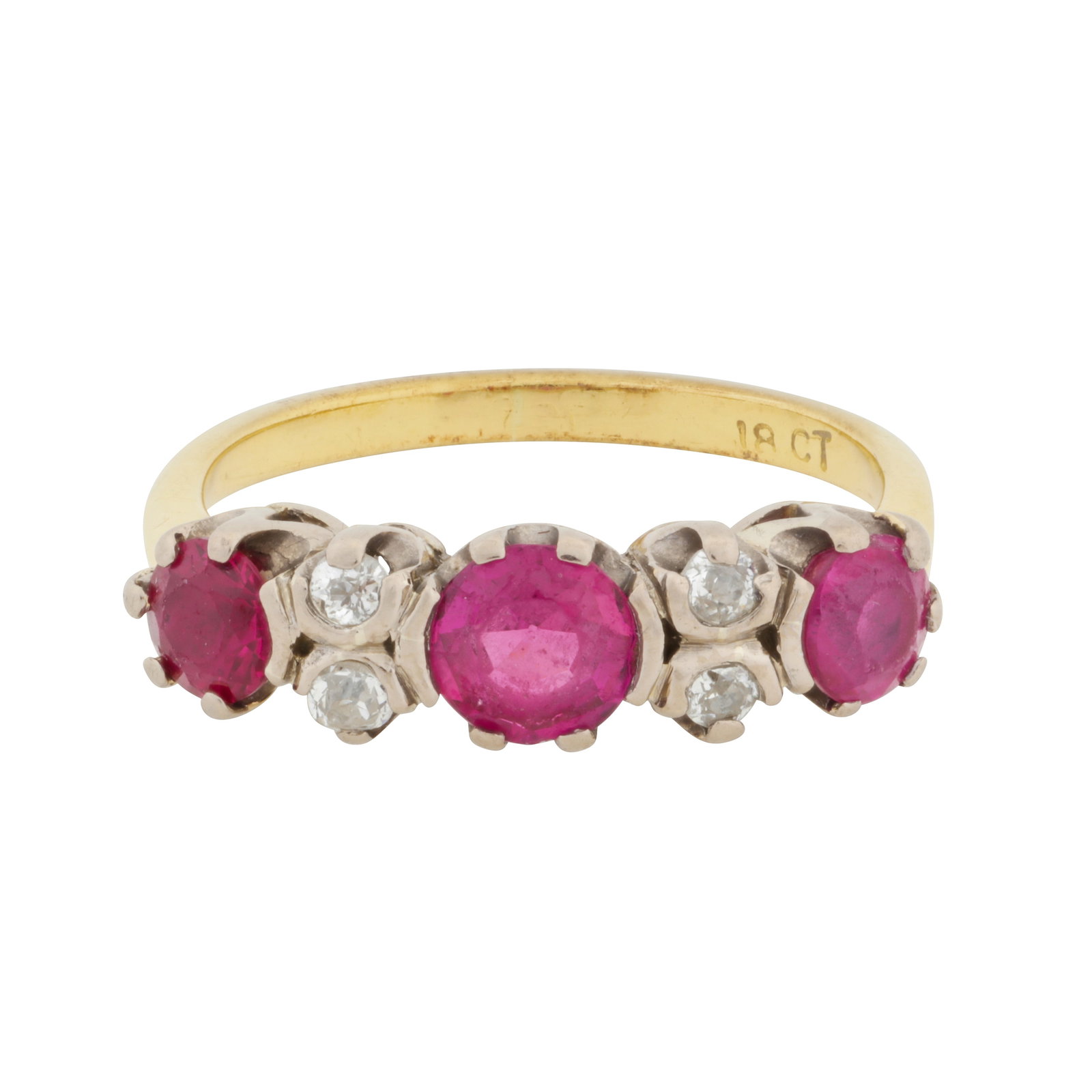 A ruby and diamond ring Yellow and white metal: A ruby and diamond ring Yellow and white metal The three circular-cut synthetic rubies spaced with pairs of old brilliant-cut diamonds, in claw setting, mounted in bi-colour metal, stamped '18ct',