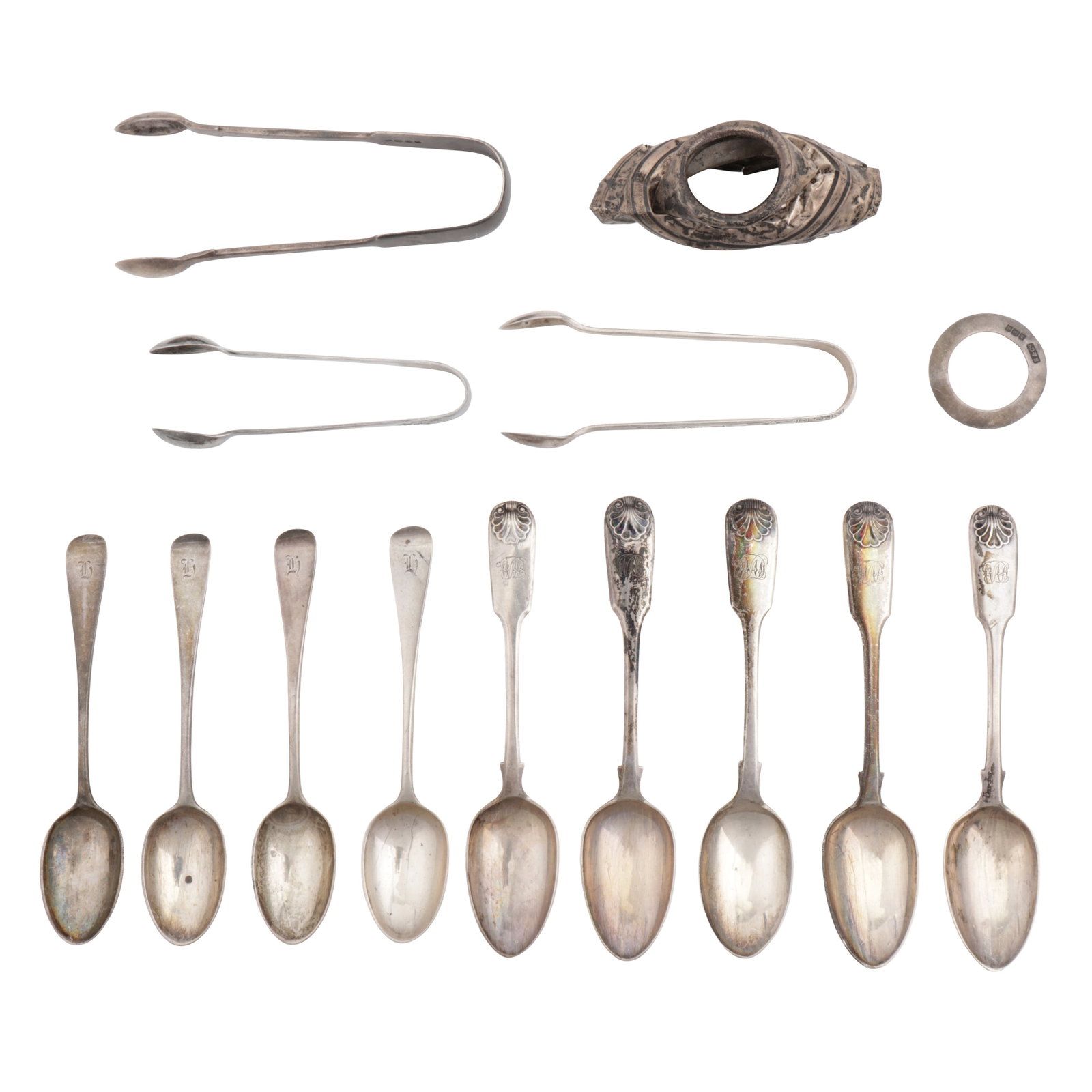 A mixed group of sterling silver flatware: A mixed group of sterling silver flatware Comprising fiddle and shell pattern Victorian teaspoons, teaspoons, three pairs of sugar tongs. (Q) Weight – 326 grams / 10.48 ozt