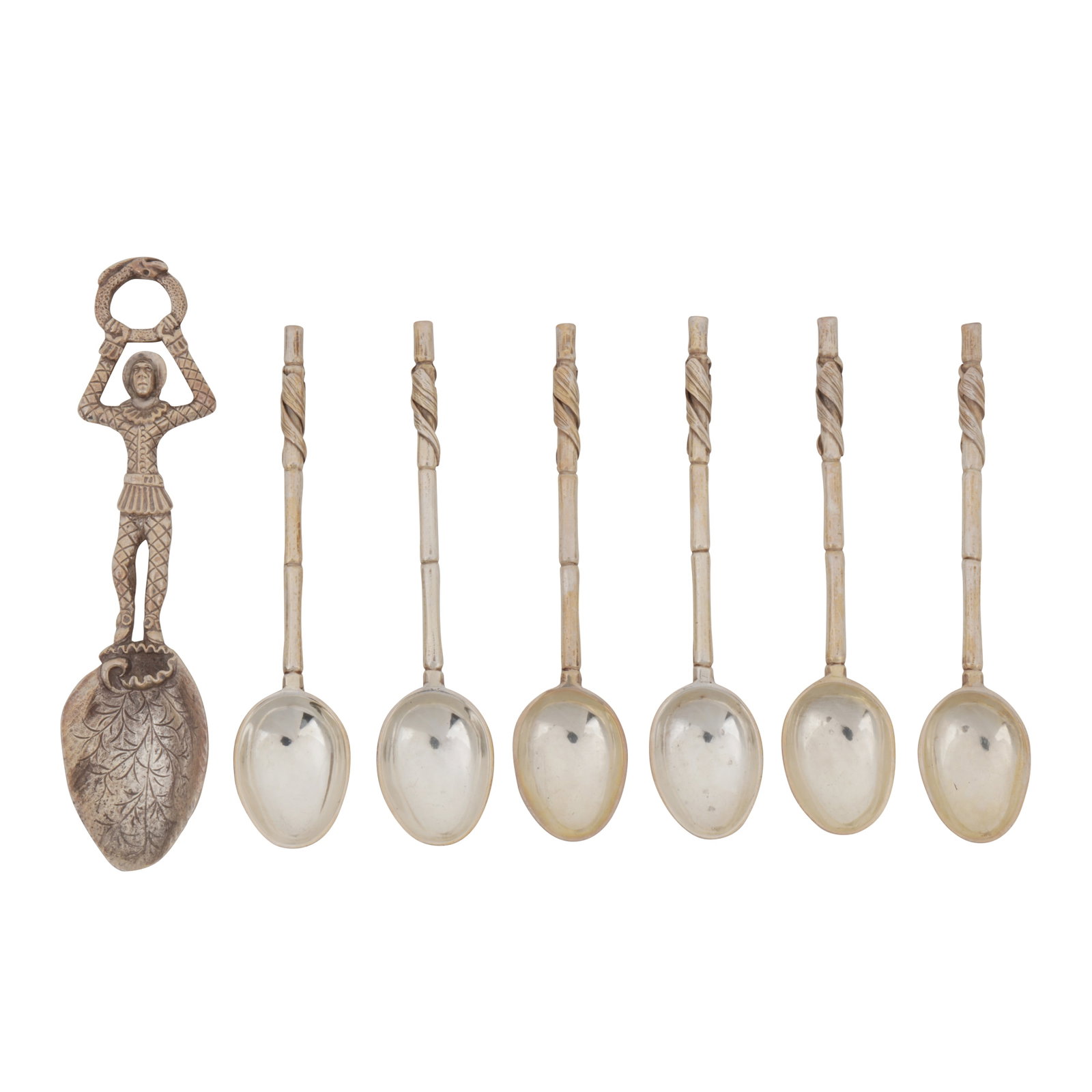 London 1845 by Susanna Cook A Victorian sterling silver cast caddy spoon: London 1845 by Susanna Cook A Victorian sterling silver cast caddy spoon The handle formed as a harlequin, the bowl as a leaf. Together with a set of sex aesthetic movement tea or coffee spoons,