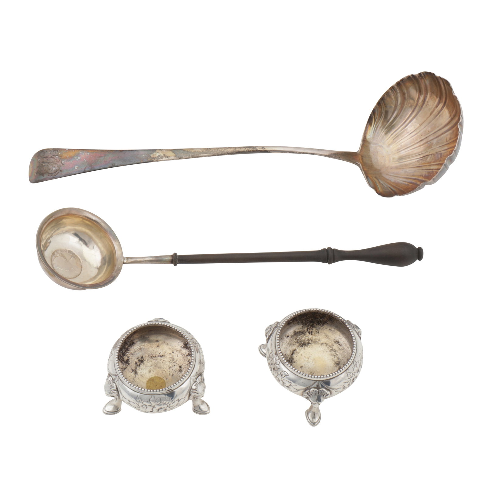 London 1764 by William Withers A George III sterling silver soup ladle: London 1764 by William Withers A George III sterling silver soup ladle Old English pattern, with shell form bowl. Together with George III punch ladle 1798, set with a Queen Anne 1707 shilling, and a 