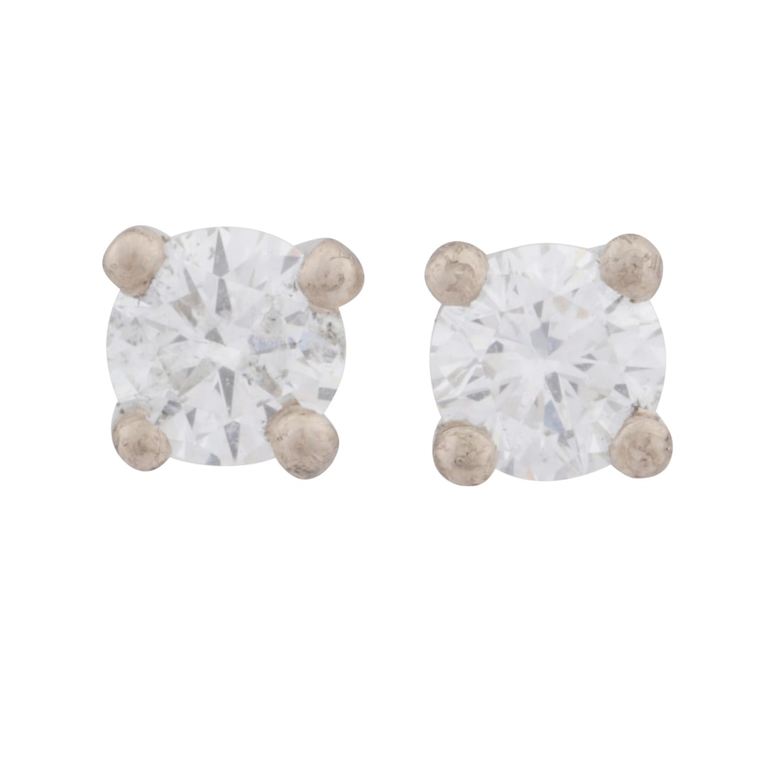 A pair of diamond stud earrings 18ct white gold: A pair of diamond stud earrings 18ct white gold Each set with a brilliant-cut diamond, post and butterfly fittings, maker's mark, UK import mark, together with a box