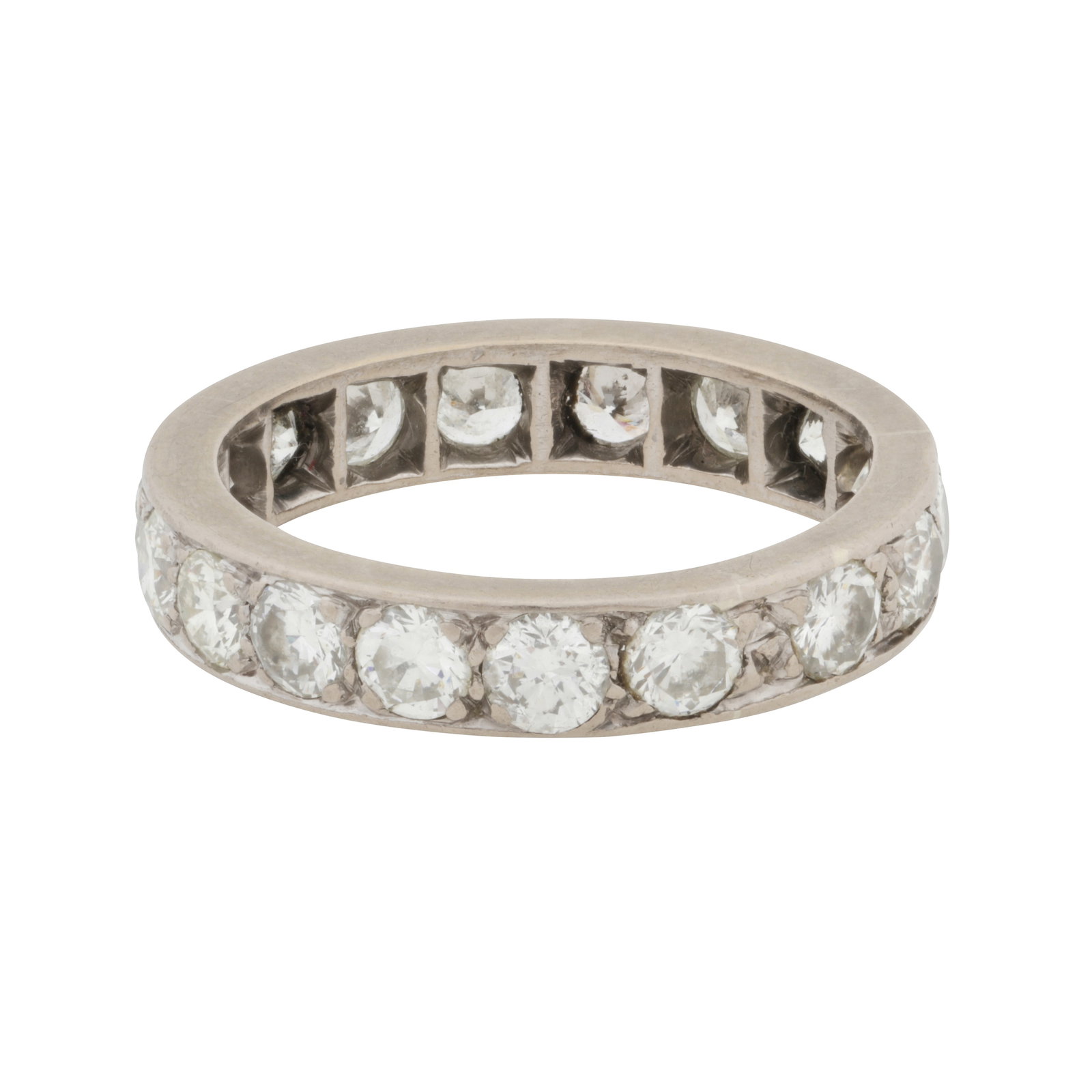 A diamond full eternity ring White metal: A diamond full eternity ring White metal Set with brilliant-cut diamonds, white metal unmarked and untested, diamonds approx. 1.40 carats total, size K