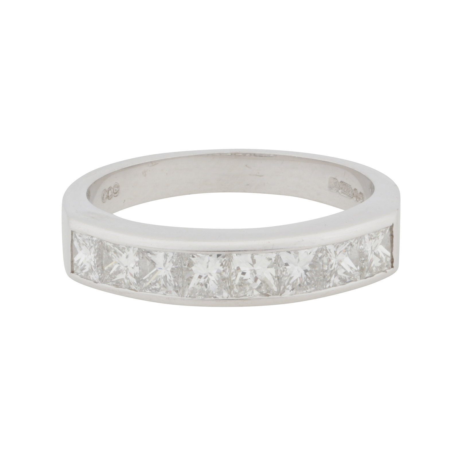 A gold and diamond ring, circa 1998 18 carat white gold: A gold and diamond ring, circa 1998 18 carat white gold Channel-set with eight princess-cut diamonds, to a tapering shank with rectangular top, mounted in 18 carat white gold, maker's mark, UK
