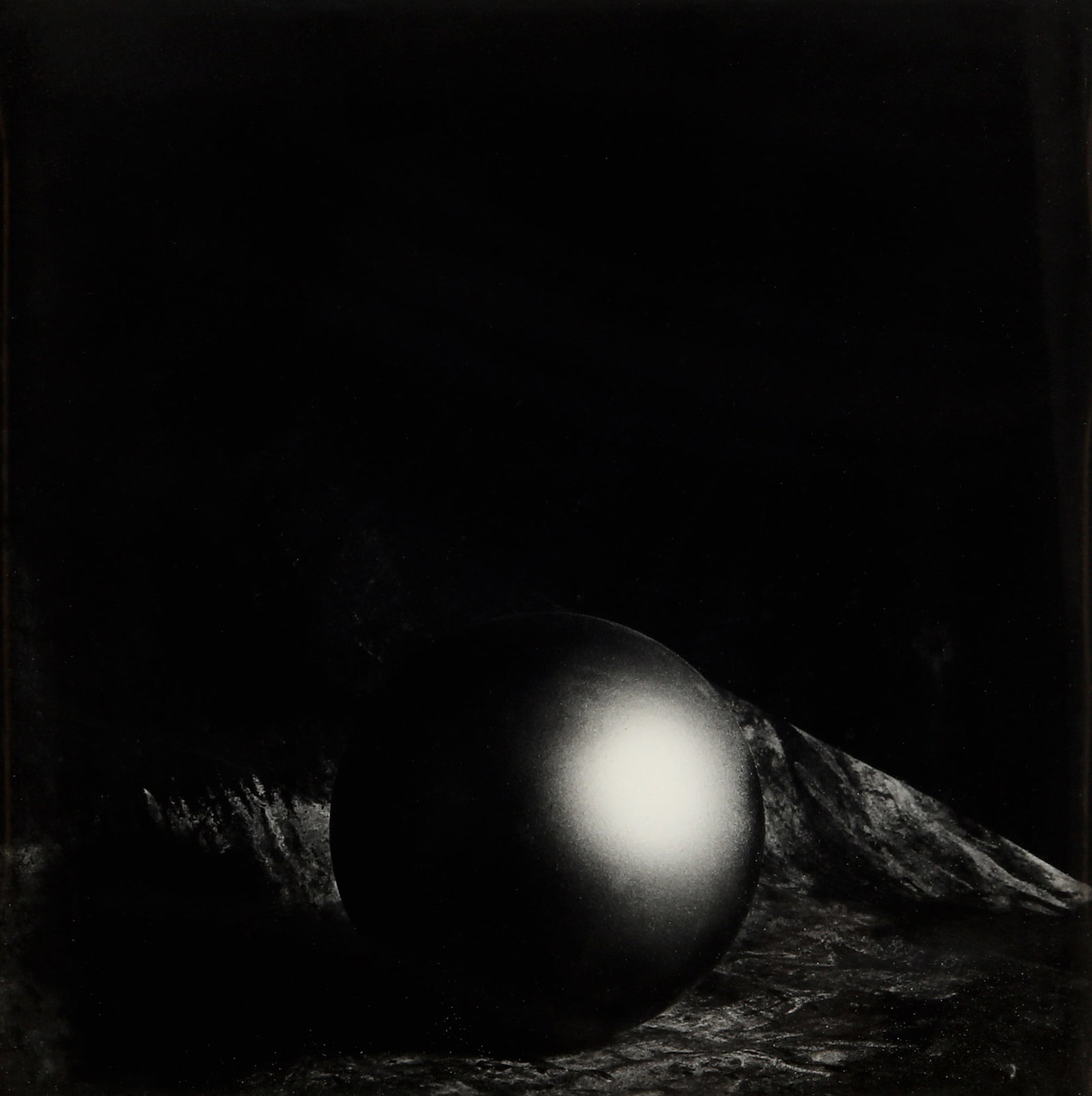 § Marcus Leatherdale (1952-2022) Sphere, 1989, from 'Vanitas': Vintage silver gelatin print, image/sheet size 33.5 x 33cm, signed, titled, dated, annotated, and editioned 3/10 by the photographer in pencil, with Leatherdale's copyright stamp verso. Housed within 