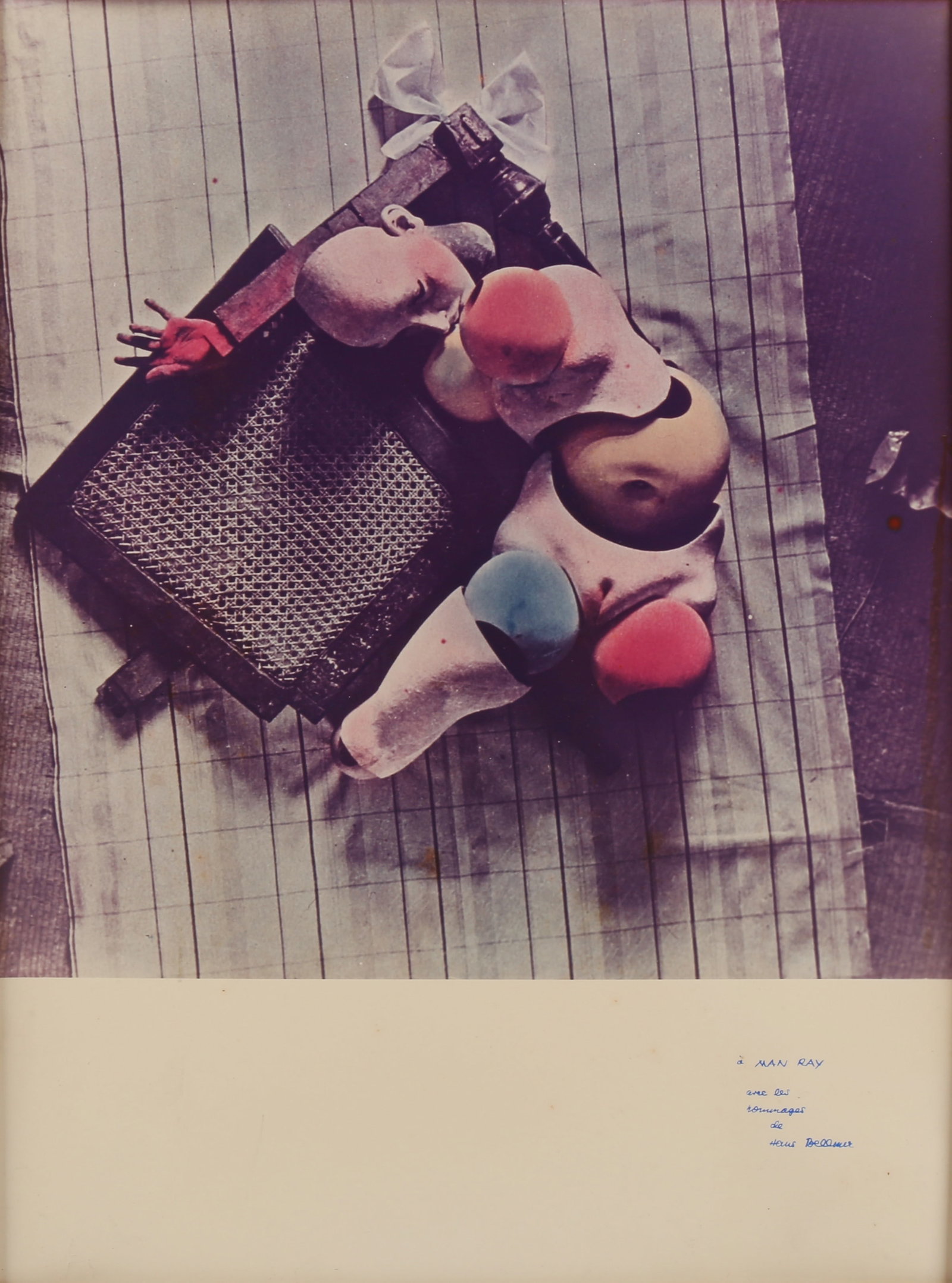 § Hans Bellmer (1902-1975) La Poupée, à Man Ray avec les hommages de Hans Bellmer, 1970: Colour-tinted silver print on Kodak paper, printed later from the 1935 negative, image size 29.5 x 29cm, sheet size 40 x 29.5cm, with the dedication to Man Ray lower right margin, editioned 23/100 in 