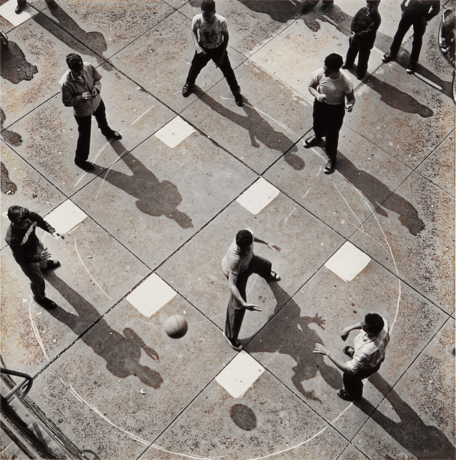 Arthur Leipzig (1918-2014) Dodge Ball, 1950: Silver gelatin print, printed later, image size 26.3 x 26cm, sheet size 35.5 x 27.7cm, signed and dated by the photographer in pencil and ink verso, with Leipzig's copyright stamp verso. Framed, frame