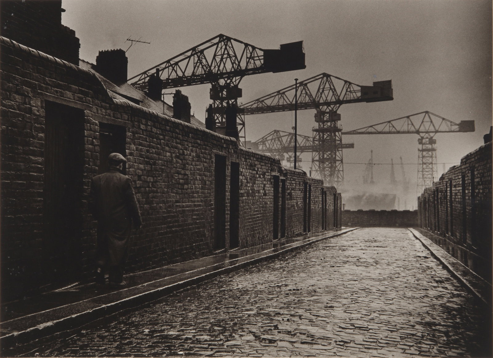 § Colin Jones (1936-2021) Wallsend, Newcastle, England, 1963: Silver gelatin print, printed later, image size 35.6 x 49cm, sheet size 40.2 x 50.5cm, signed, titled, and dated by the photographer in pencil verso, with Jones' copyright credit stamp.