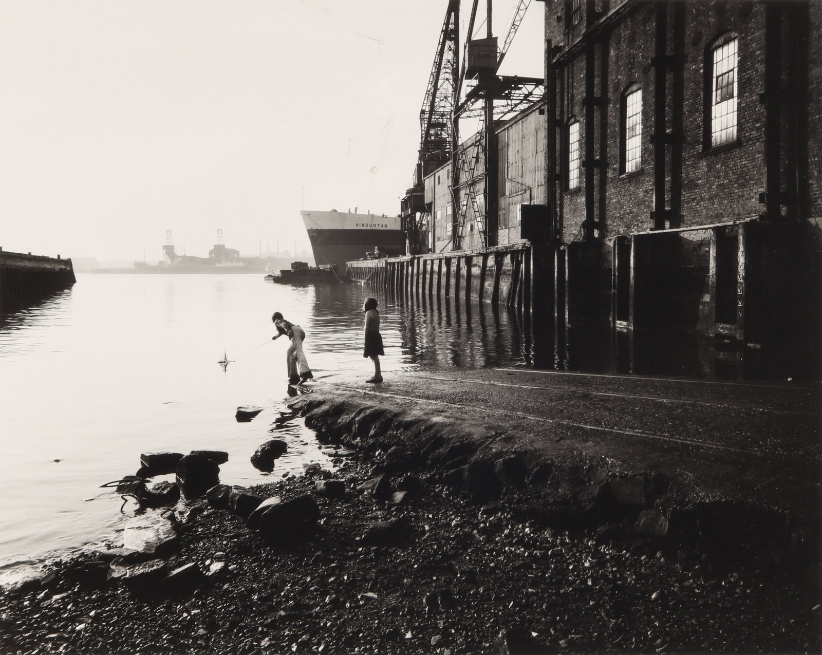 § Graham Smith (b.1947) South Shields, 1976: Silver gelatin print, printed 1996, image size 29.2 x 36.8cm, sheet size 40.5 x 50.5cm, signed, titled, dated, and inscribed by the photographer in pencil verso.