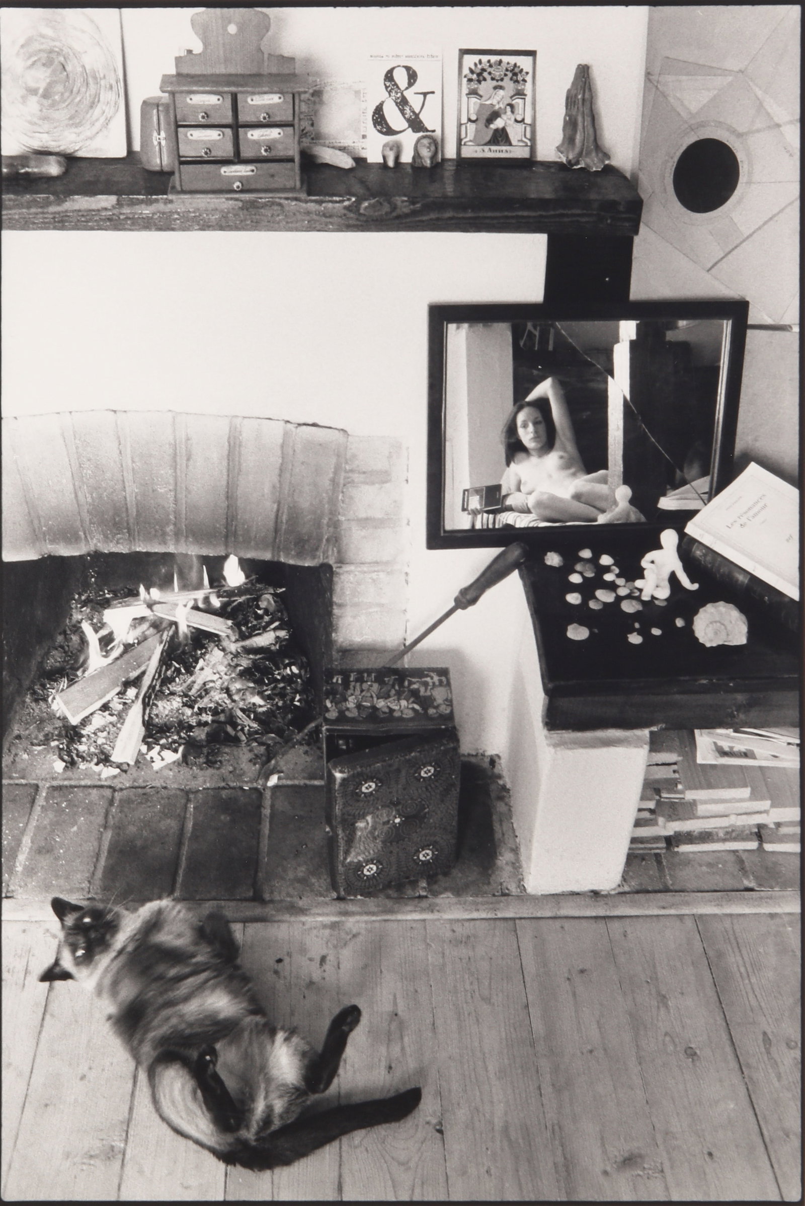 § Marc Riboud (1923-2016) Room in Prague, 1982: Vintage silver gelatin print, image size 27.2 x 18cm, sheet size 29 x 19.5cm, inscribed by the photographer in pencil with Riboud's copyright stamp verso.