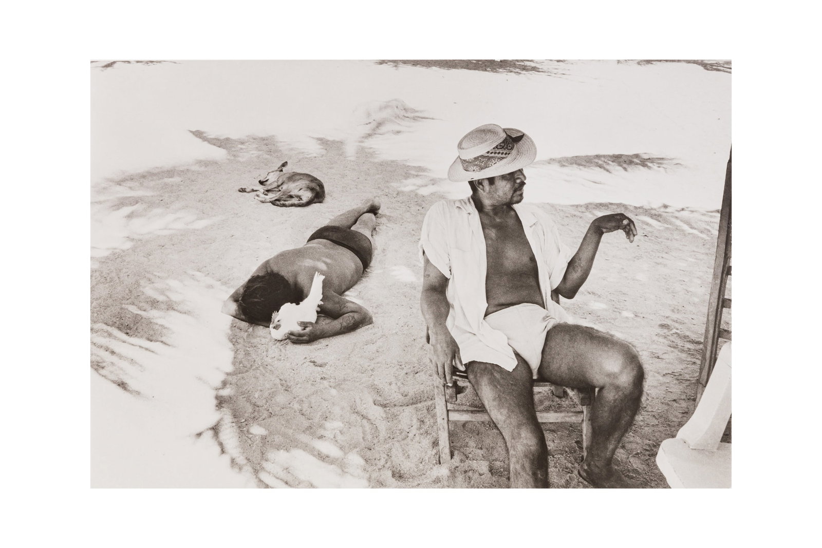 § Marc Riboud (1923-2016) Siesta, Acapulco, Mexico, 1959: Silver gelatin print, printed 1980s, image size 24 x 36cm, signed and inscribed "To Bob K, avec mon amitie" by the photographer in ink lower margin recto, titled and dated in pencil by the photographe