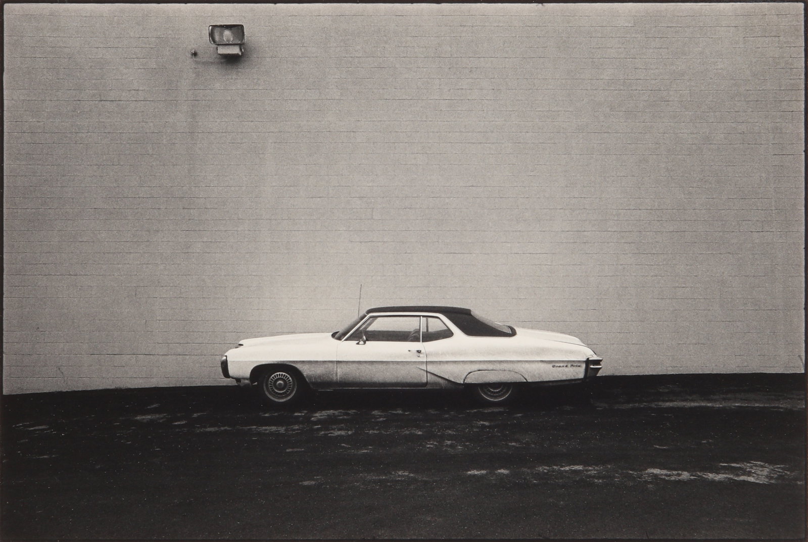 Terry Wild (b.1947) Suburbia [California & Pennsylvania], 1971-1972: A group of nine vintage silver gelatin prints, each flush-mounted to card, images measuring 13 x 19.3cm, cards measuring 25.5 x 28cm, each signed and dated by the photographer in pencil lower margin r