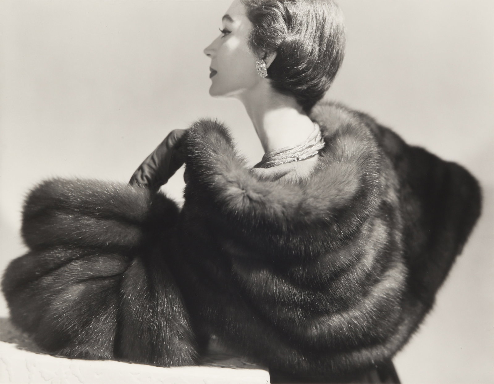 Horst P. Horst (1906-1999) Dovima With Fur, NY, 1953: Silver gelatin print, printed later, image size 35 x 45.5cm, sheet size 40.2 x 50.2cm, with photographer's blind stamp in the margin, signed by the photographer in pencil, titled, dated and annotated 