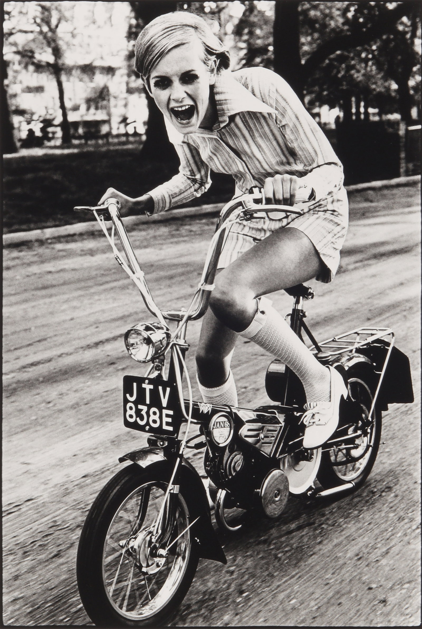 Ronald Traeger (1936-1968) Twiggy Bike, 1967: Silver gelatin print, printed 2002, image size 36.5 x25cm, sheet size 50.5 x41cm, edition 3/20, titled, dated, numbered in pencil verso, with photographer's facsimile signature, and stamp verso.