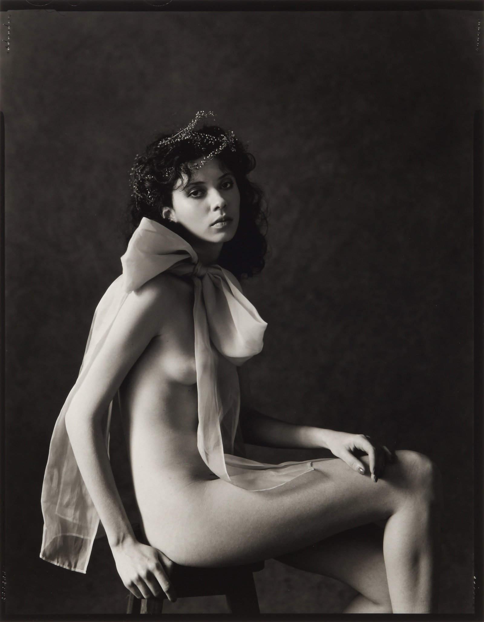 § Cathleen Naundorf (b.1968) Girl with a Bow, 2020: Selenium-toned silver gelatin print, Image size, 57 × 45cm, Sheet size, 61cm × 50.5cm, Edition 1/10, Signed, titled and annotated in pencil on the verso; with photographer’s copyright stamp and ed