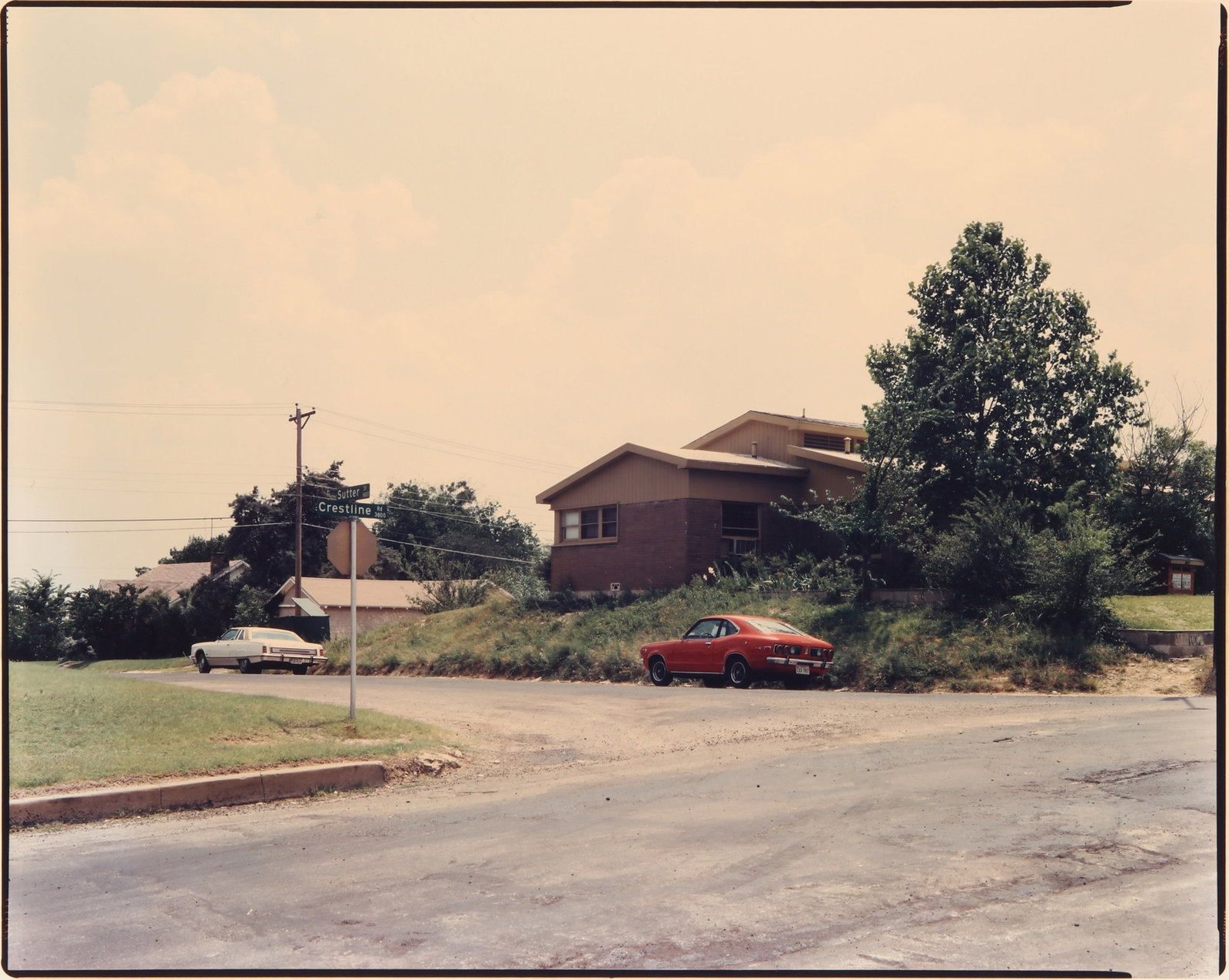Stephen Shore (b.1947) Sutter Street and Crestline Road, Fort Worth, Texas, June 3, 1976: Chromogenic print, image size 36 x 46cm, sheet size 50.6 x 40.6cm, signed, titled and dated by the photographer in black ink verso. Framed, frame size 63.5 x 72cm. Provenance:Swann, New York, Photogra
