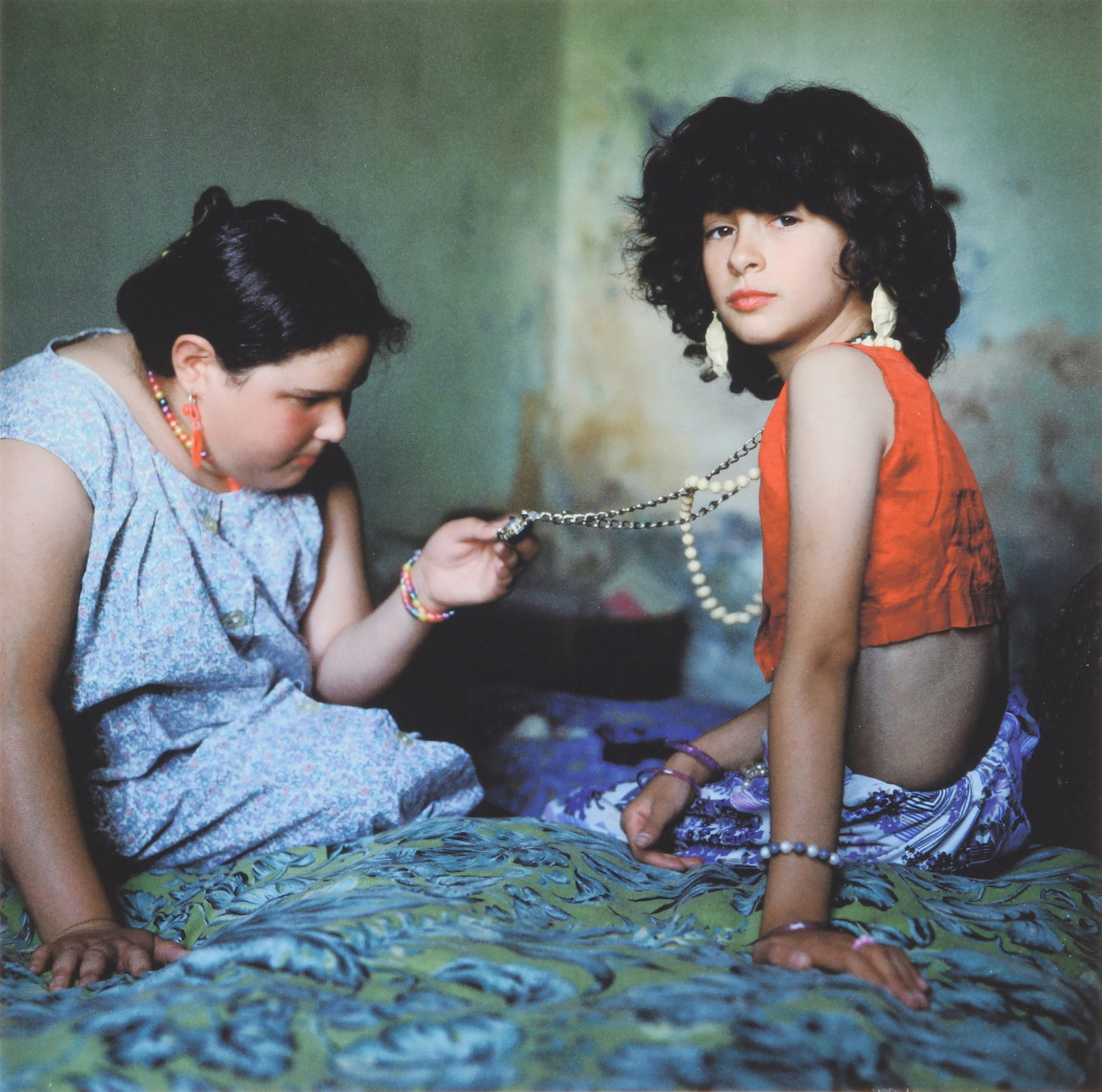 Alessandra Sanguinetti (b.1968) The Necklace, 1999: Archival pigment print, printed c.1999, image size 22.9 x 22.9cm, sheet size 28 x 28cm, signed and dated in pencil verso. Provenance:Acquired by the present owner from Paddle8, 12 Jun 2017