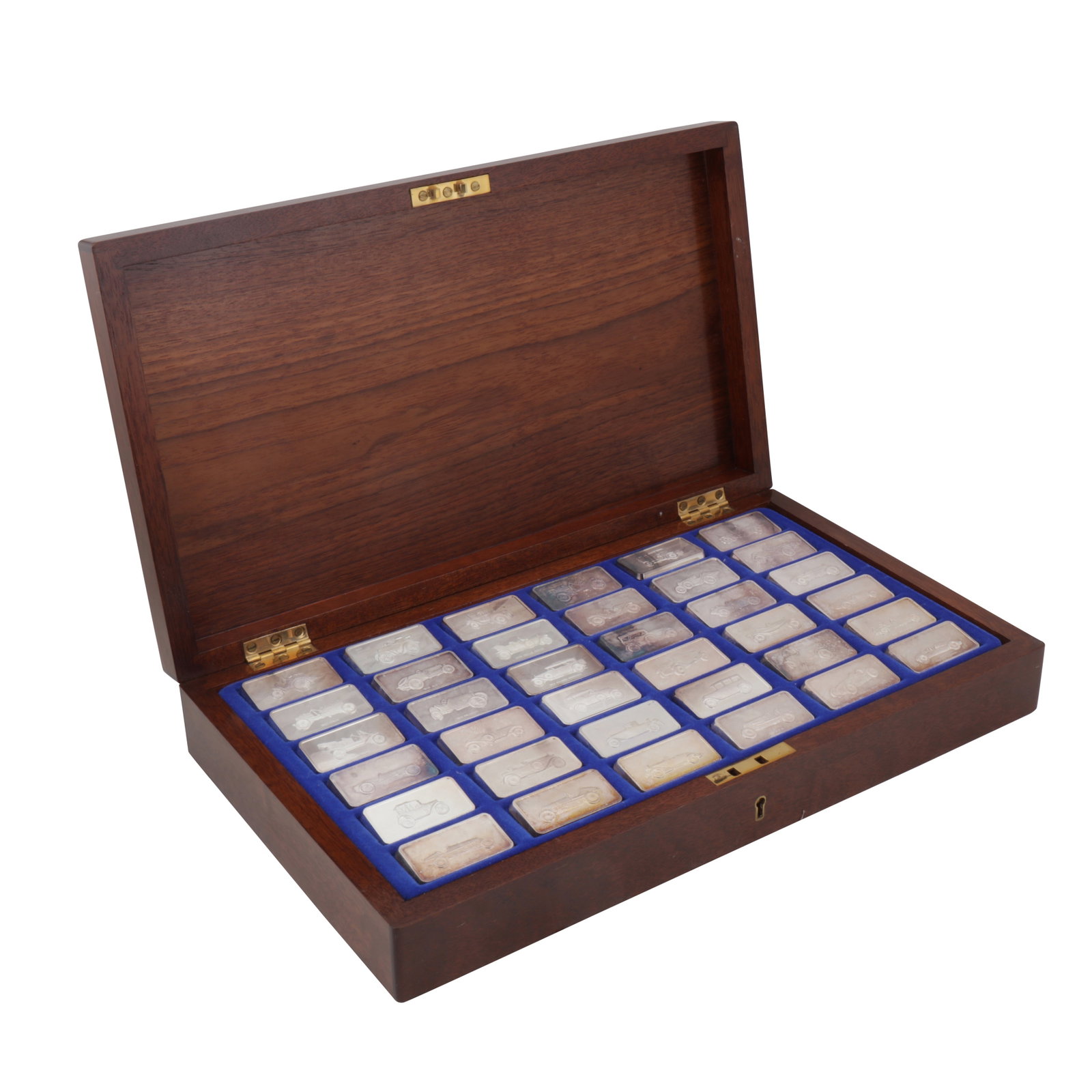 London 1974 by John Pinches An Elizabeth II cased set of thirty-six sterling silver ignots: London 1974 by John Pinches An Elizabeth II cased set of thirty-six sterling silver ignots The Lord Montagu Collection of Great Cars. Case length - 41.5 cm / 15.9 inches Weight - 2376 grams / 76.39 oz