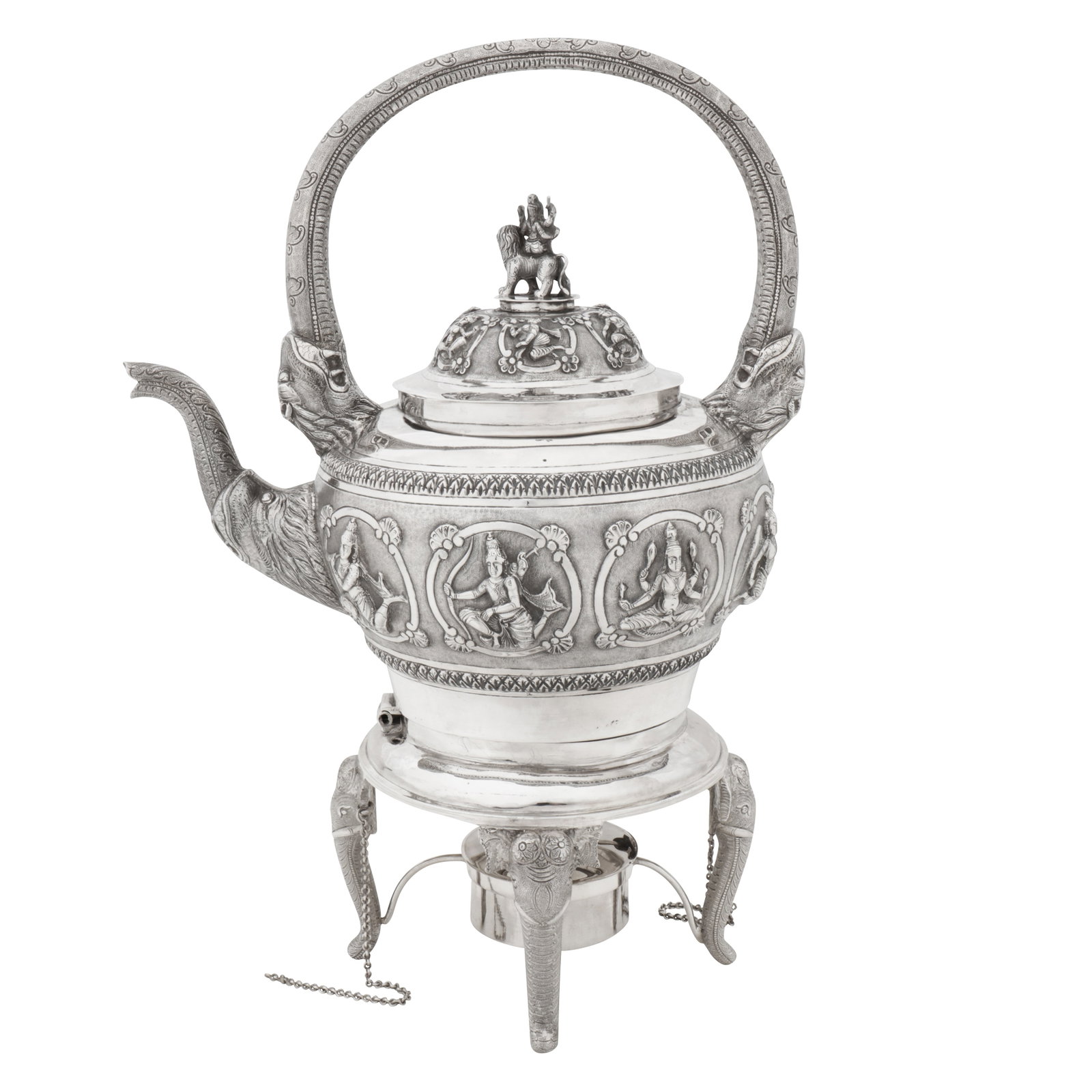 Bombay circa 1920 An early 20th century Anglo-Indian unmarked silver kettle on stand: Bombay circa 1920 An early 20th century Anglo-Indian unmarked silver kettle on stand Raj period. Of rounded circular form upon a stand formed as four elephant’s heads with a pull-out burner lamp, re