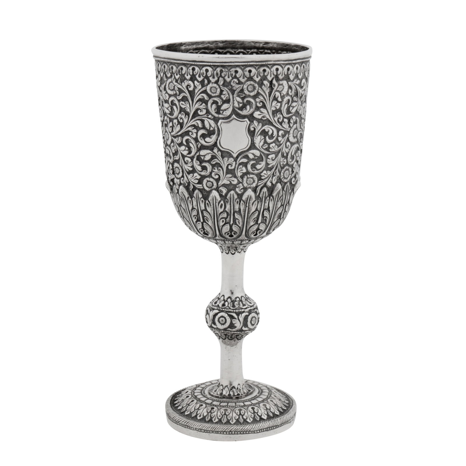Cutch circa 1880 A late 19th century Anglo – Indian unmarked silver goblet: Cutch circa 1880 A late 19th century Anglo – Indian unmarked silver goblet Raj period. Of rounded circular form upon a domed circular foot with spherical knop stem. The body with chased decoration o