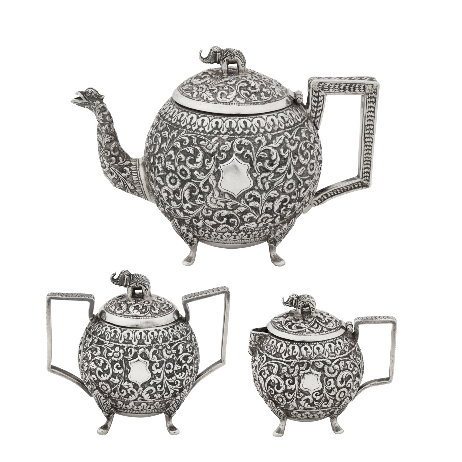 Cutch circa 1880 A late 19th century Anglo-Indian unmarked silver three-piece bachelor tea service (1 of 10)