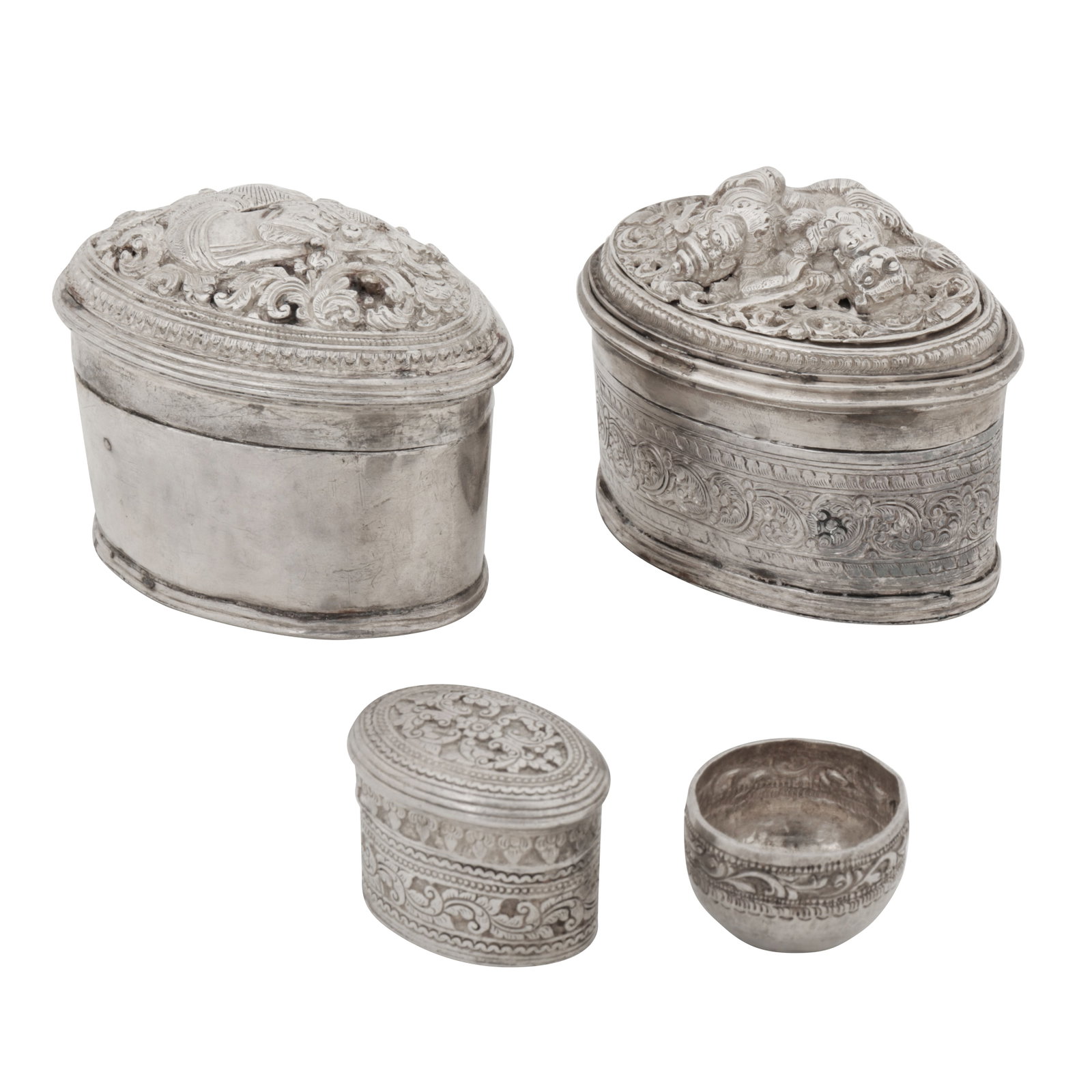 Shan State circa 1900 A late 19th / early 20th century Burmese silver lime box: Shan State circa 1900 A late 19th / early 20th century Burmese silver lime box Of oval form with a pull off lid, with a screw affixed embossed and pierced panel of Ravana attacking Sita, all against f