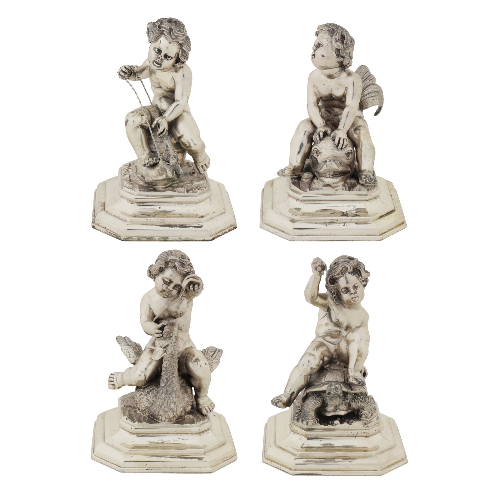 Milan circa 1950 by Caputo Francesco (reg. 6th May 1938) A set of four mid-20th century Italian 800: Milan circa 1950 by Caputo Francesco (reg. 6th May 1938) A set of four mid-20th century Italian 800 standard silver cast table ornaments Each formed as a putto riding a different animal; snail, tortoi