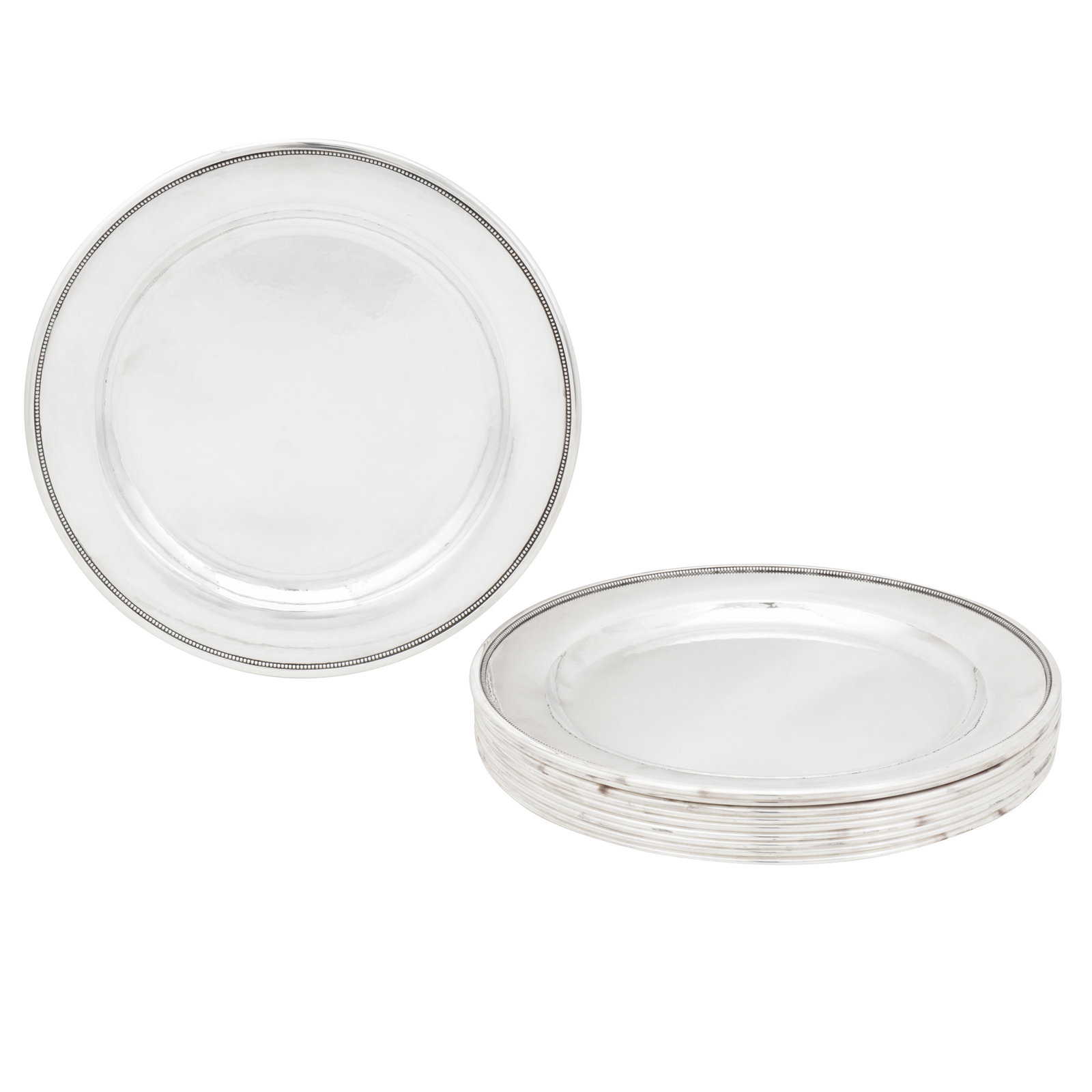 Copenhagen post-1944 by Georg Jensen A cased set of ten mid to late 20th century Danish sterling: Copenhagen post-1944 by Georg Jensen A cased set of ten mid to late 20th century Danish sterling silver under plates / chargers Circular form with an ovolo edge and a beaded and plain rim. Lightly pla