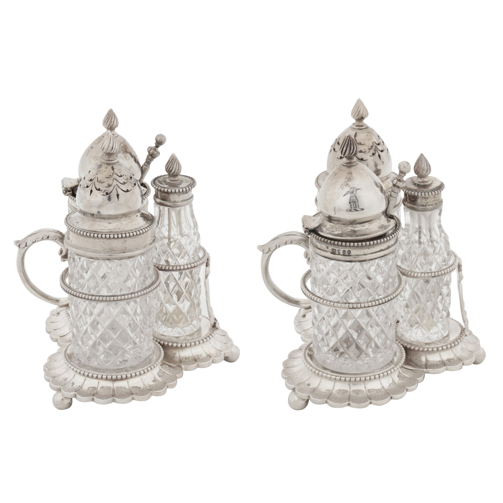London 1875 by Robert Harper A pair of Victorian sterling silver breakfast cruets: London 1875 by Robert Harper A pair of Victorian sterling silver breakfast cruets The stands of trefoil form rosed upon three ball feet with double C scroll handle leading to three galleried retaining