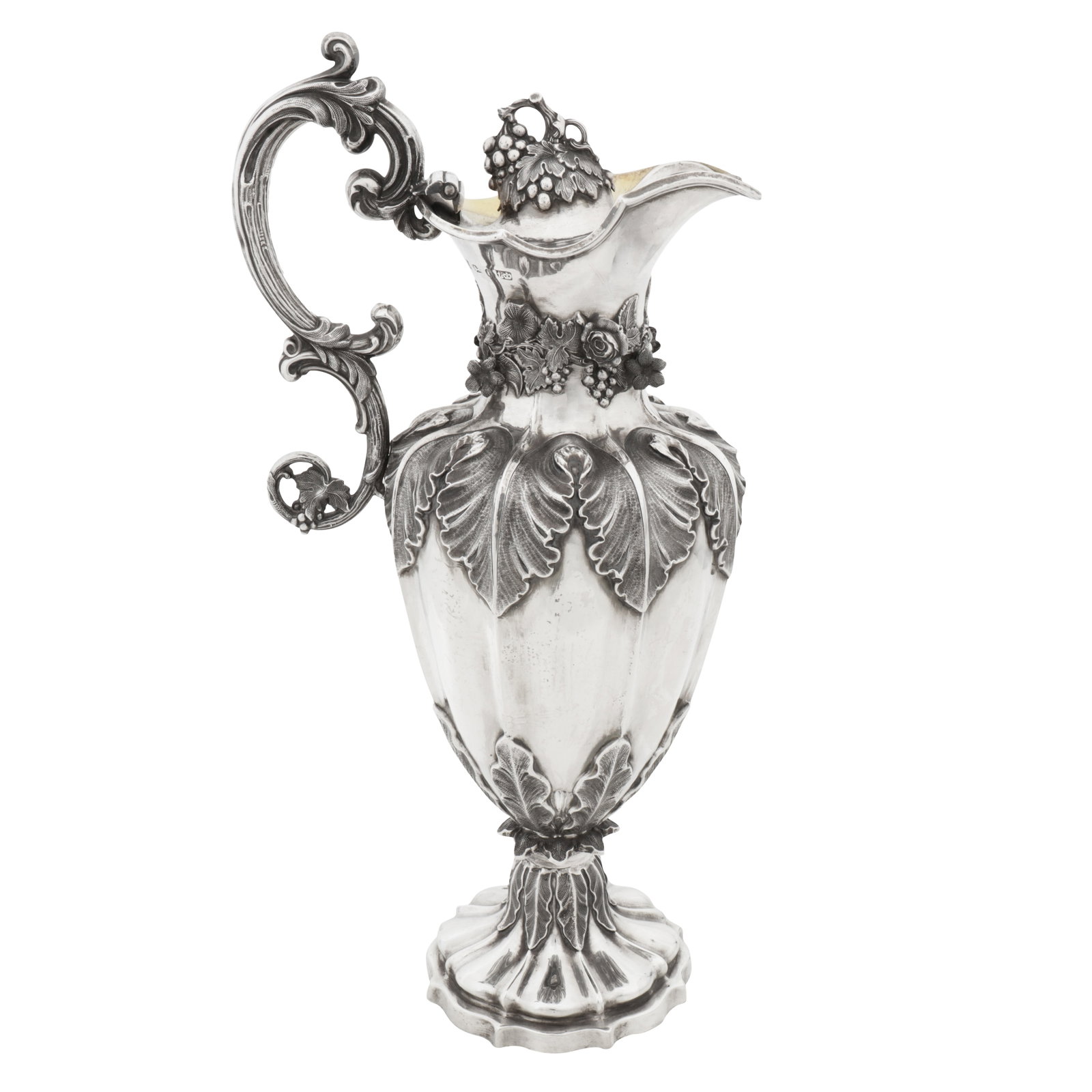 Sheffield 1839 by Henry Wilkinson and Co A Victorian sterling silver wine ewer or claret jug: Sheffield 1839 by Henry Wilkinson and Co A Victorian sterling silver wine ewer or claret jug Of lobed inverted baluster from upon a lobed circular foot, an acanthus capped double C scroll handle leadi