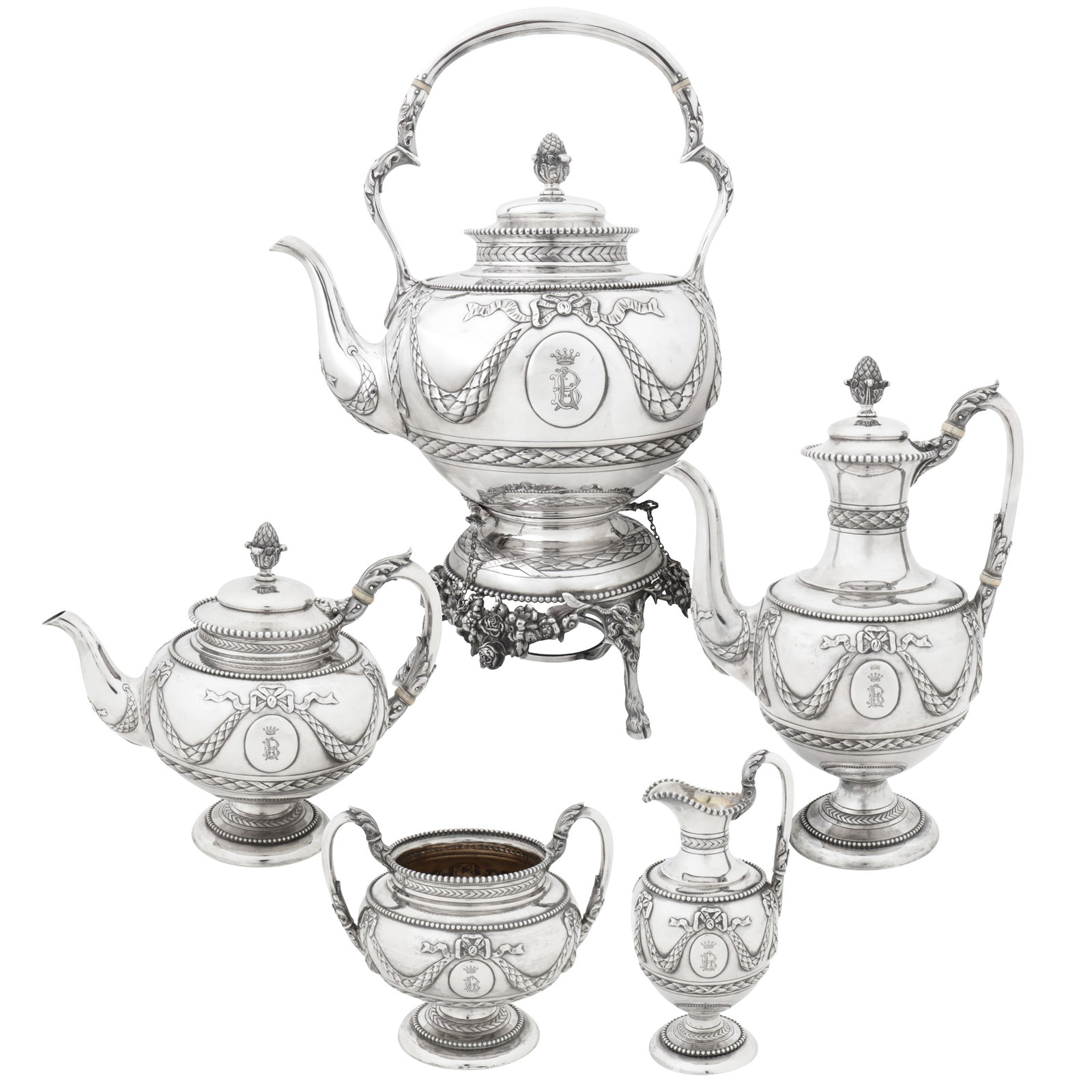 London 1874/75 by Robert Hennell IV A Victorian sterling silver five-piece tea and coffee service: London 1874/75 by Robert Hennell IV A Victorian sterling silver five-piece tea and coffee service Comprising a teapot, a coffee pot, a milk jug, a twin handled sugar bowl, and a kettle on burner stamp
