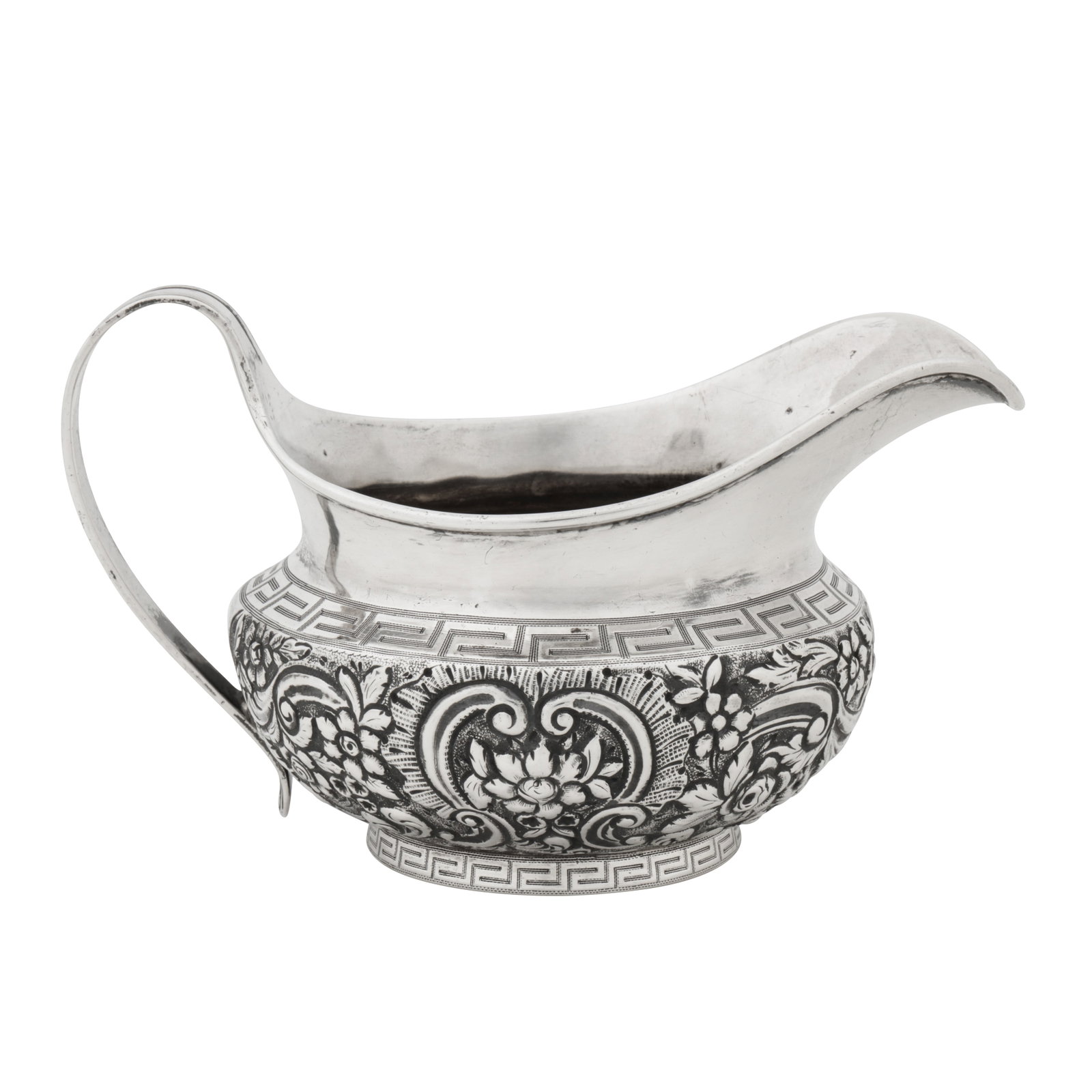 London 1803 by John Emes A George III sterling silver milk jug: London 1803 by John Emes A George III sterling silver milk jug Of rounded circular form upon a collet foot, with a reeded strap handle. The body with an engraved band of Greek key decoration, also wit