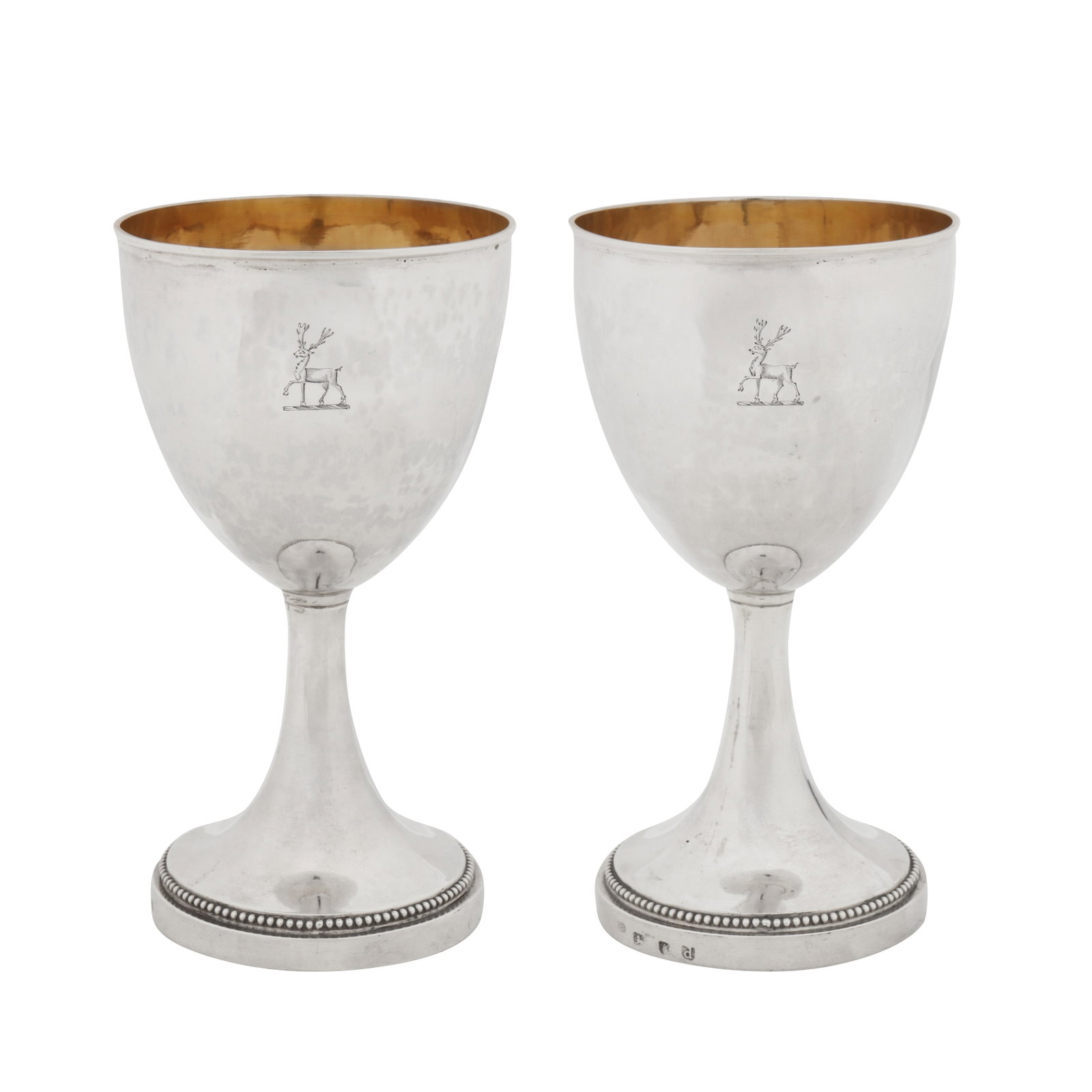 London 1779 by Peter Desvignes (reg. 26th Jun 1771) (probably) A pair of George III sterling silver: London 1779 by Peter Desvignes (reg. 26th Jun 1771) (probably) A pair of George III sterling silver wine goblets Of rounded circular form with a moulded rim upon a pedestal foot with beaded edge. Each