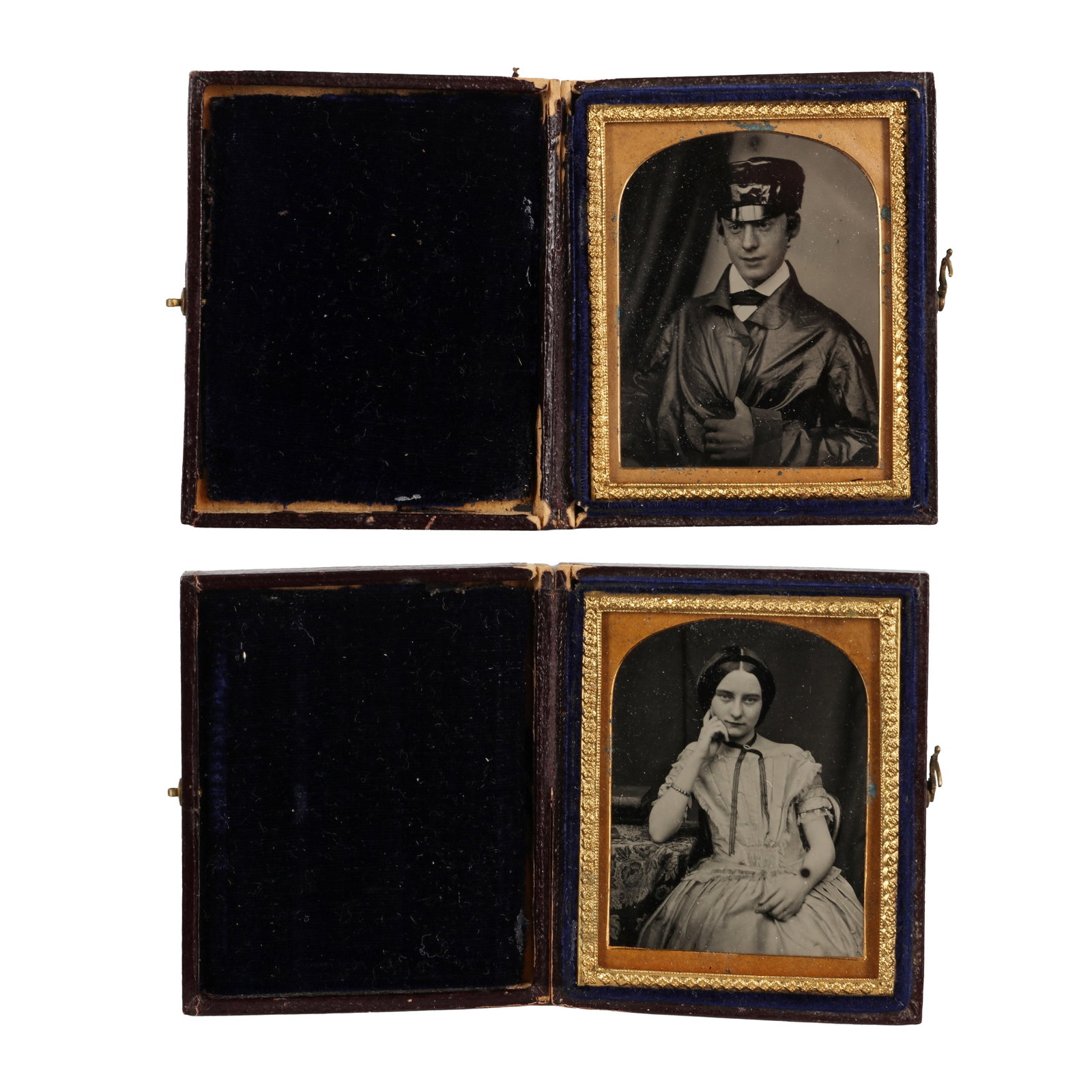 William & Charles Oakeshott (XIX cent.) Portraits Studies, c.1855-1857: A pair of ninth-plate monochromatic ambrotypes (2 x 2.5), each depicting a young woman in a white dress, leaning on a table, and a young man in a long trench in top-arched plain brass matt; decorated 