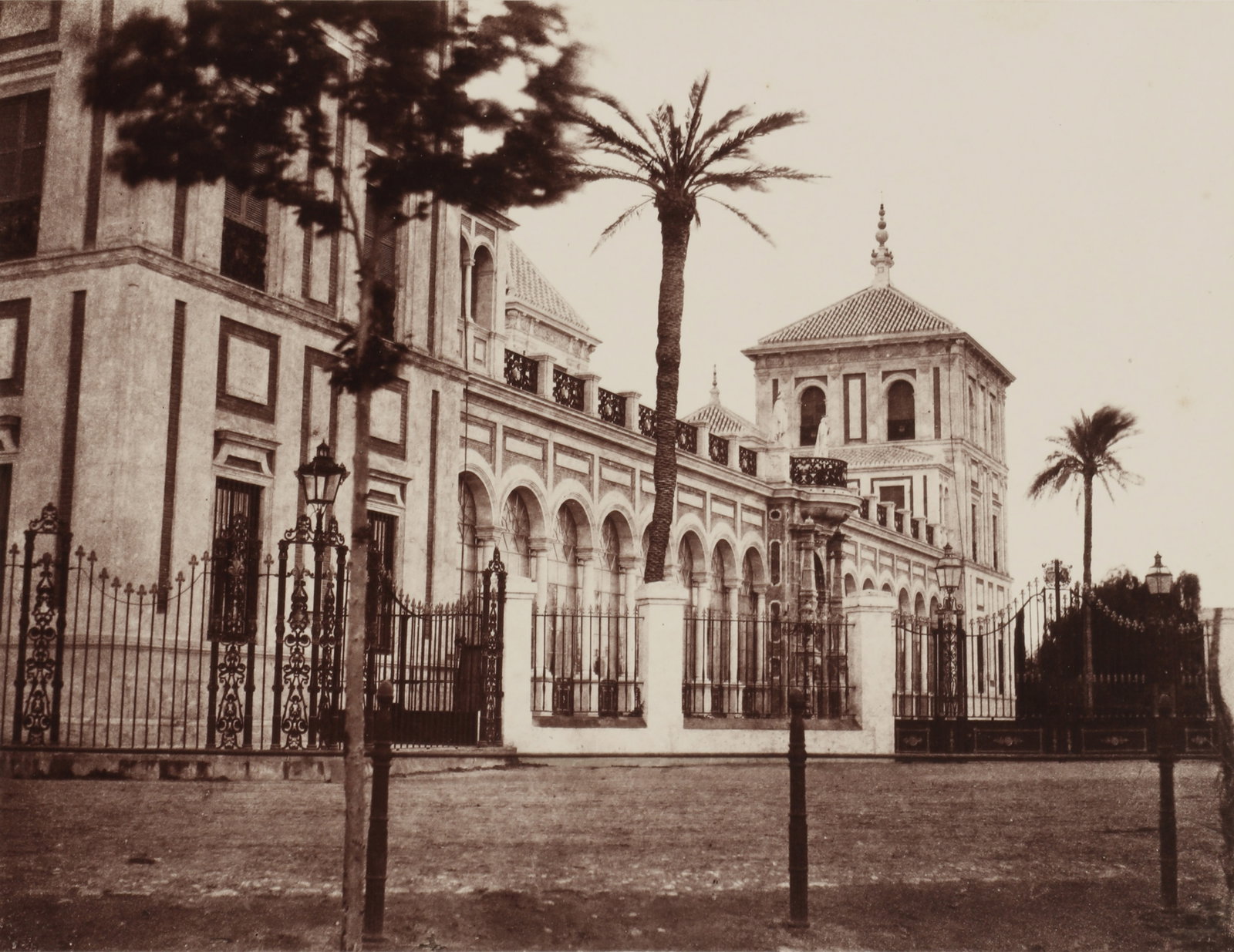 Louis de Clercq (1836-1901) Palace of San Telmo, Seville, Spain. c.1861.: Albumen print from waxed paper negative, image size 21.5 x28cm, on original mount, overall measuring 45.5 x59.5cm, with printed title, and photographer's stamp on mount. This plate appeared in the six