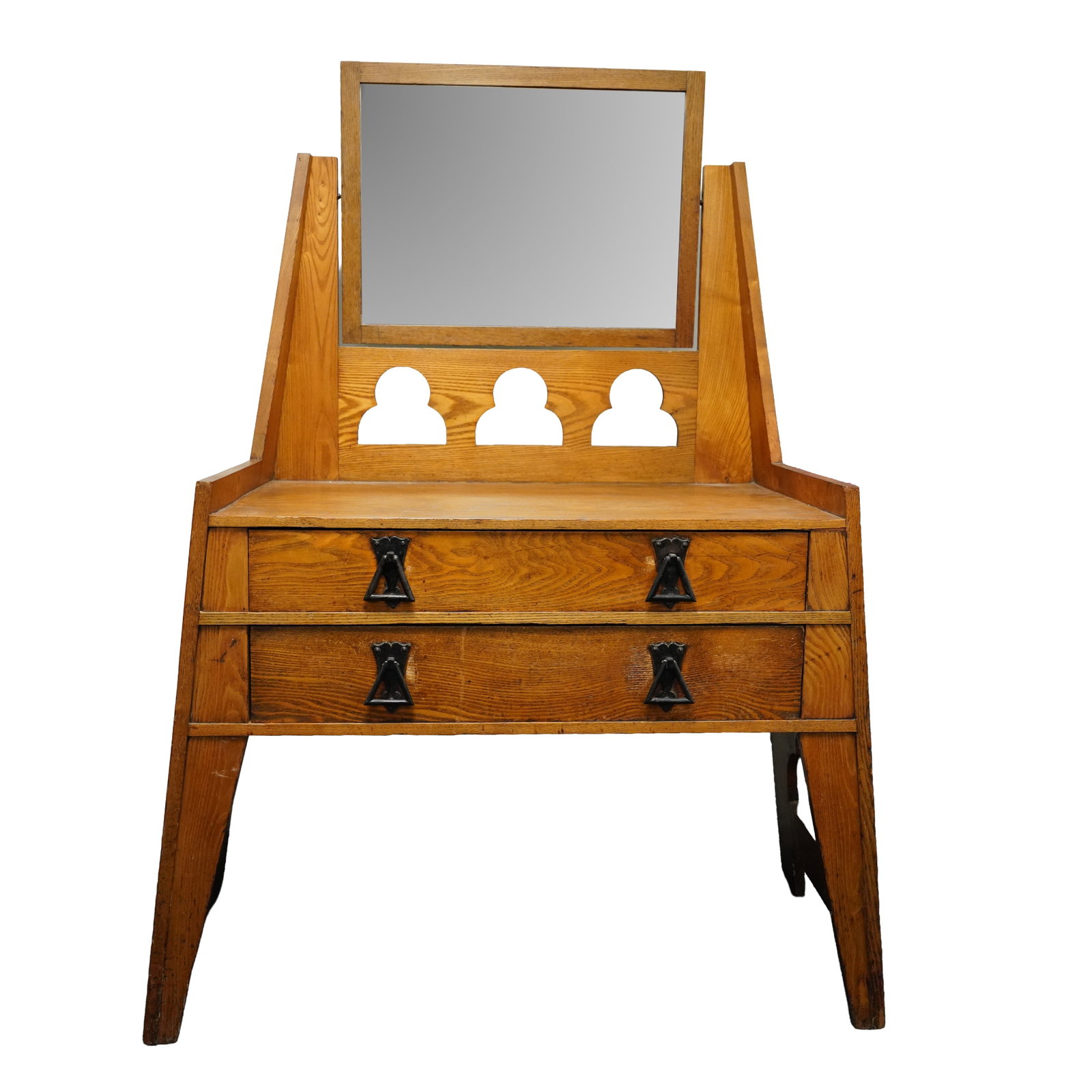 Liberty & Co, London Arts and crafts dressing table: Oak, mirror, metal handles Ivorine plaque to inner drawer 'LIBERTY & CO. LTD, LONON, W' and drawer stamped with 'Rd No. 232372' 105cm max width x 143cm high x 52cm deep