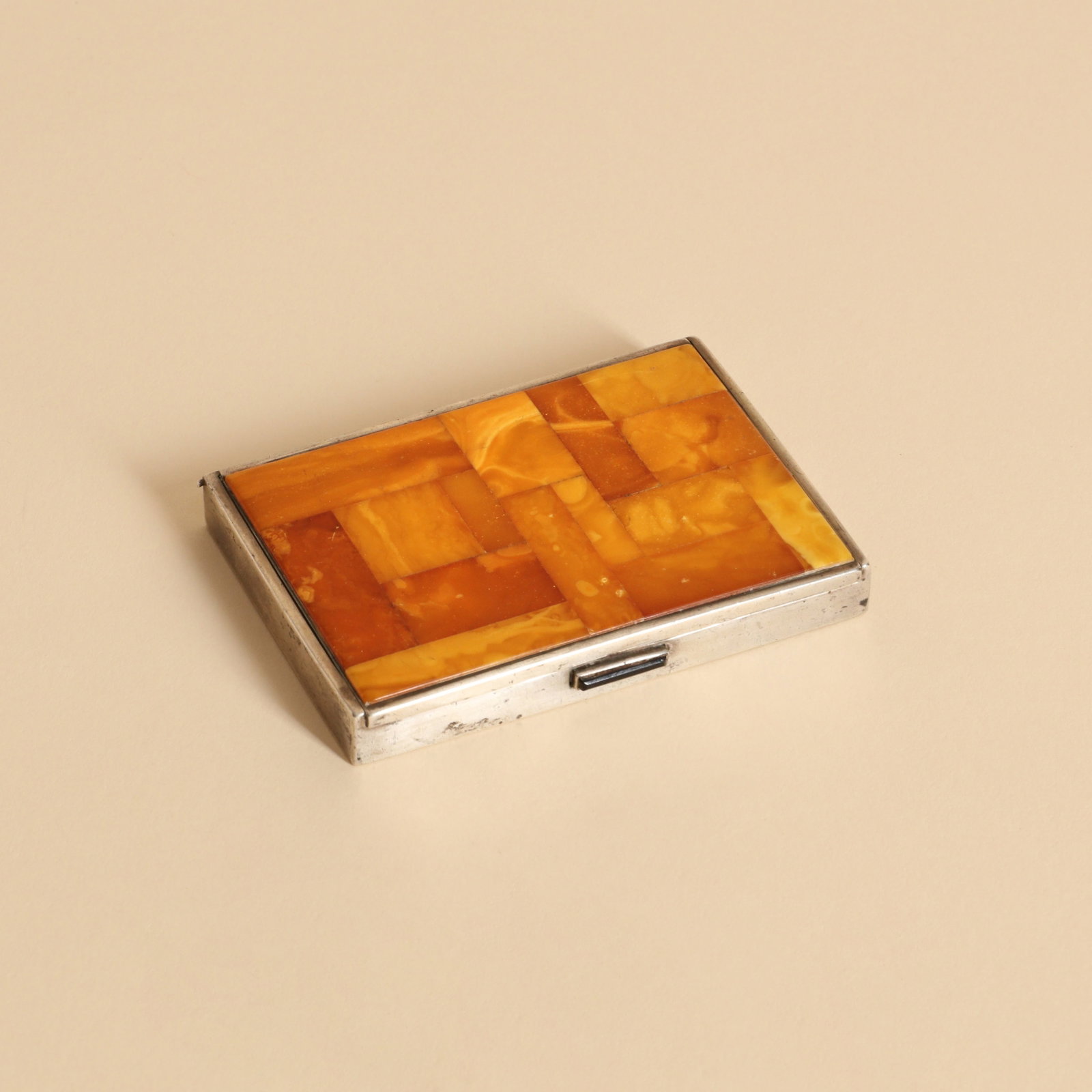 Art Deco (possibly German) Cigarette case: Circa 1930 White metal, amber plaques, onyx No marks found 8.5 x 6 x 1cm