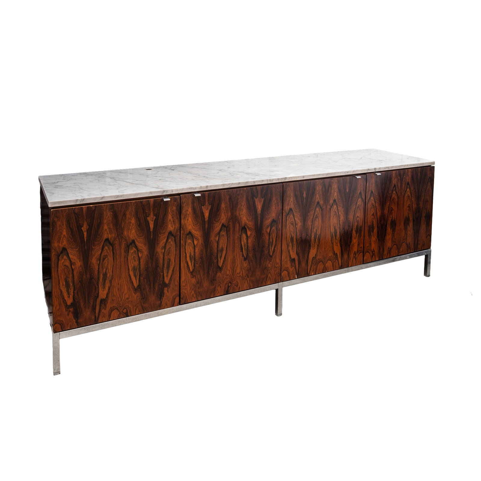 Florence Knoll (American, 1917-2019) Four Door Credenza: Circa 1960s White carrara marble, rosewood, chrome 65.5cm high x 189.5cm wide x 45.5cm deep
