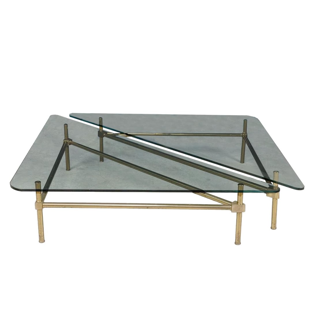 Late 20th Century, Italy A pair of side or coffee tables: 1980s Glass, polished brass 37cm high x 145cm wide x 205cm long