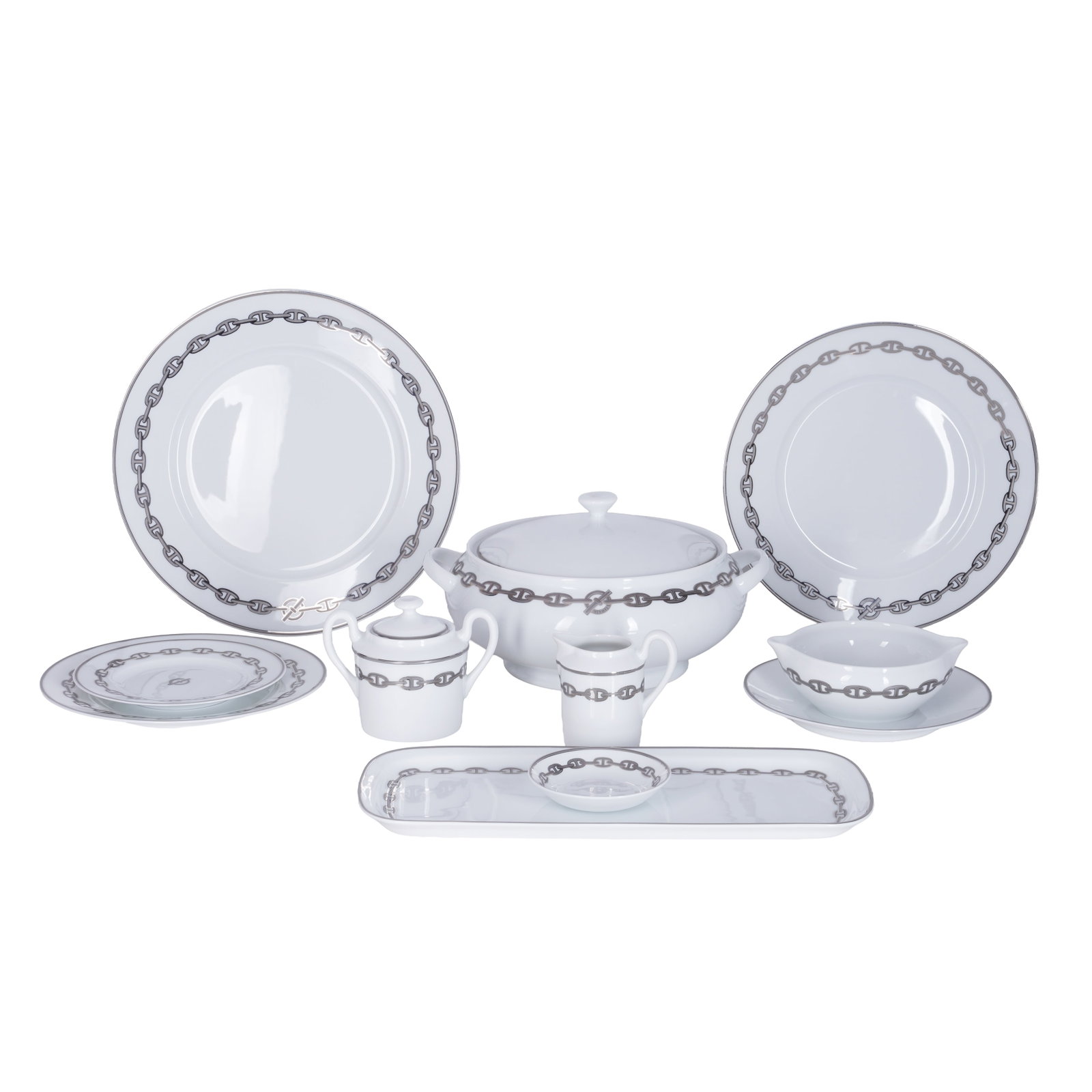 Philippe Mouquet for Hermes, Paris A extensive 81 piece Hermes Porcelain Chaine D'Ancre Set dinner: 20th Century Screenprinted and hand painted porcelain, Hermes link decoration Each piece with Hermes makers marks to underside Service comprises 1 Presentation plate, 1 sauce boat, 1 ashtray, 2 pin tr