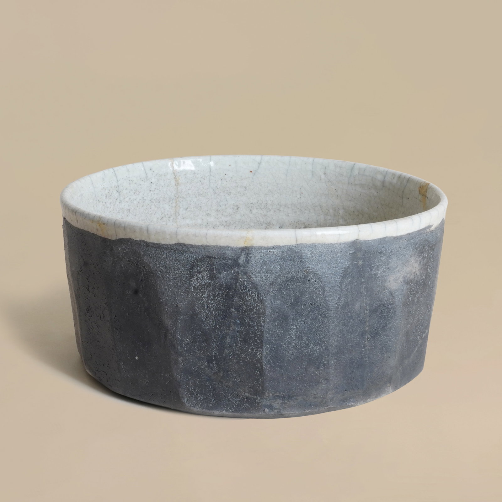 Inger Rokkjaer (Danish 1934-2008) Elliptical-form cut-sided black bowl with cream rim and interior (1 of 3)