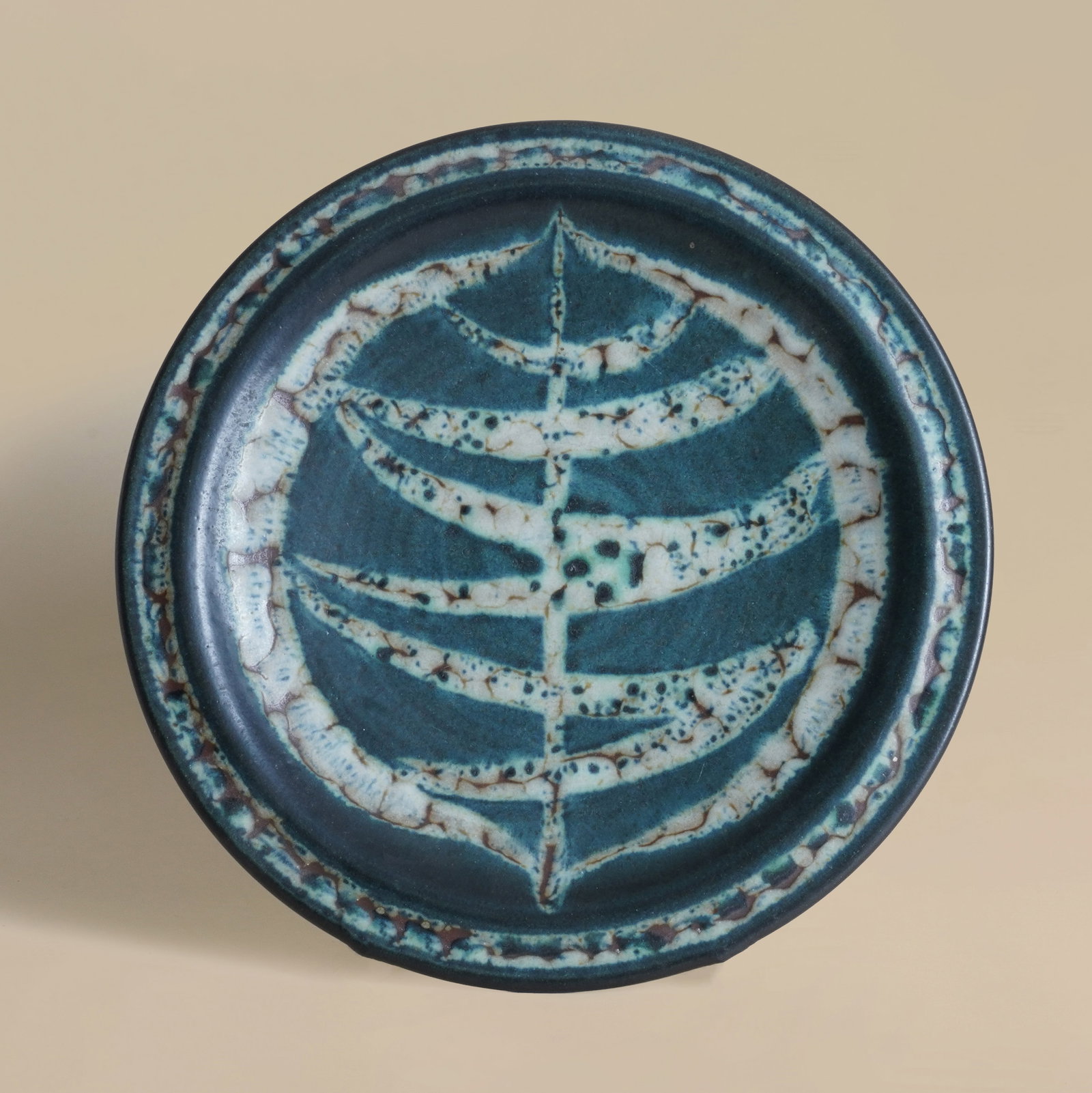 Harrison McIntosh (American 1914-2016) Charger with wax resist decoration (1 of 2)