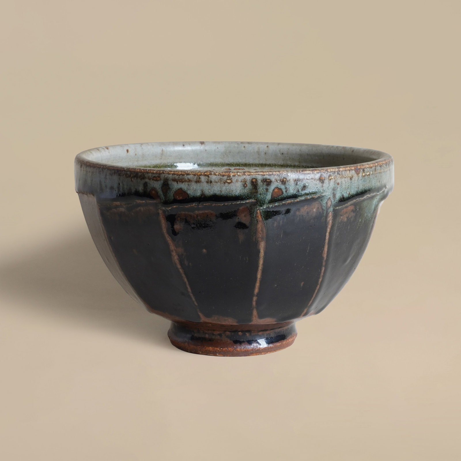 Richard Batterham (British 1936-2021) Large cut sided bowl in brown-black: Glazed stoneware Unsigned 13.5cm high