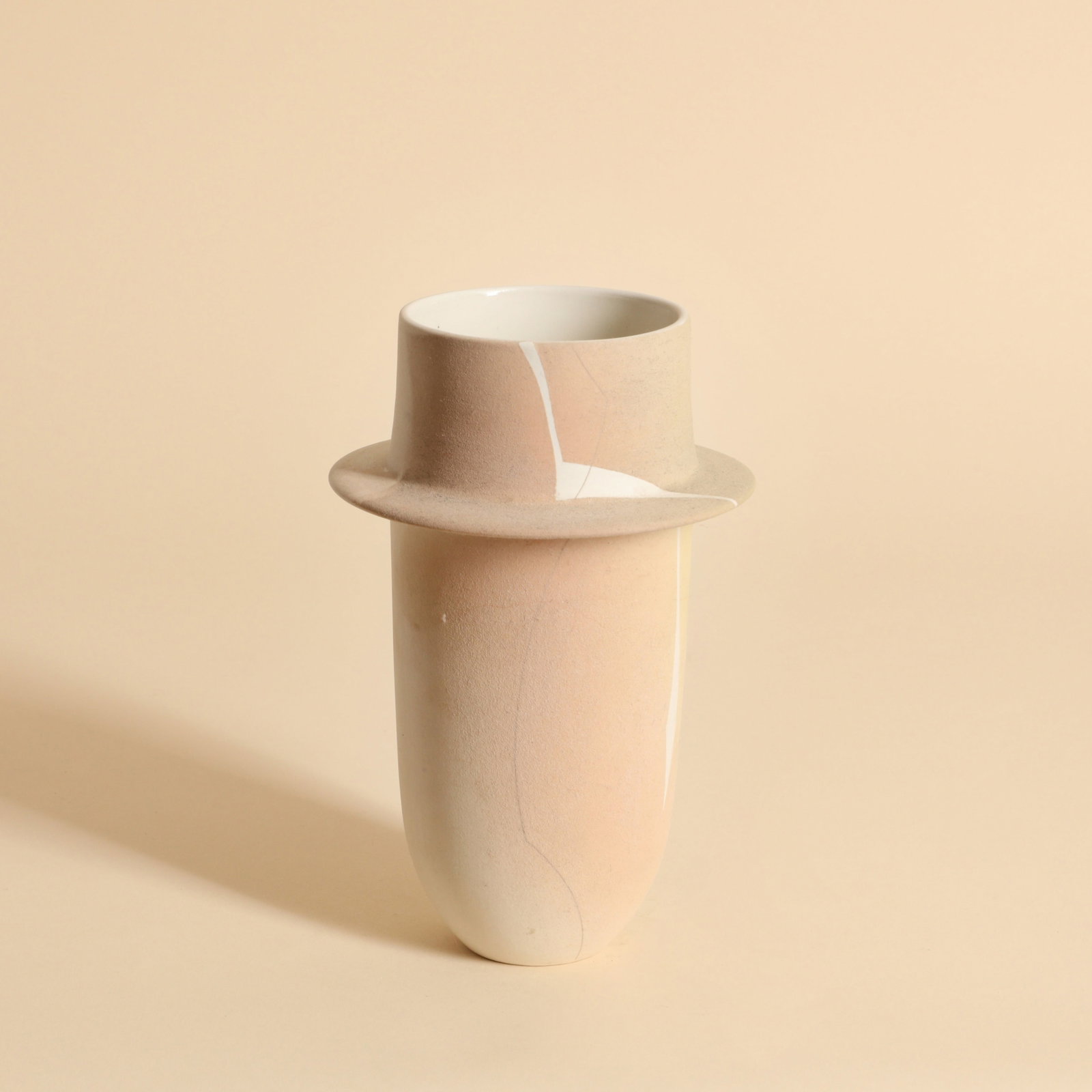 British studio ceramics Vessel with disk to neck, in peach with white splashes (1 of 3)