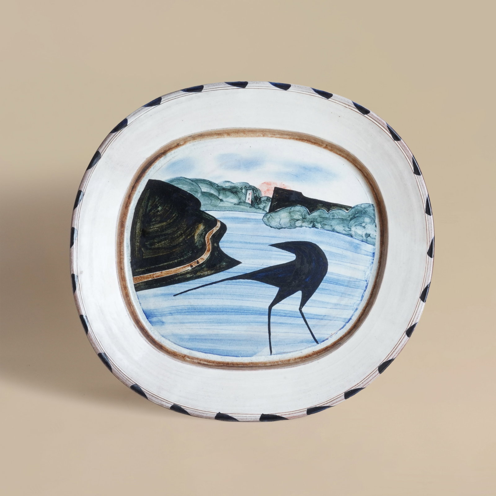 James Campbell (British 1942-2019) Crow and castle painted dish: 1996 Glazed earthenware Verso incised 'Campbell / 96 : 59' 35.5 x 33cm
