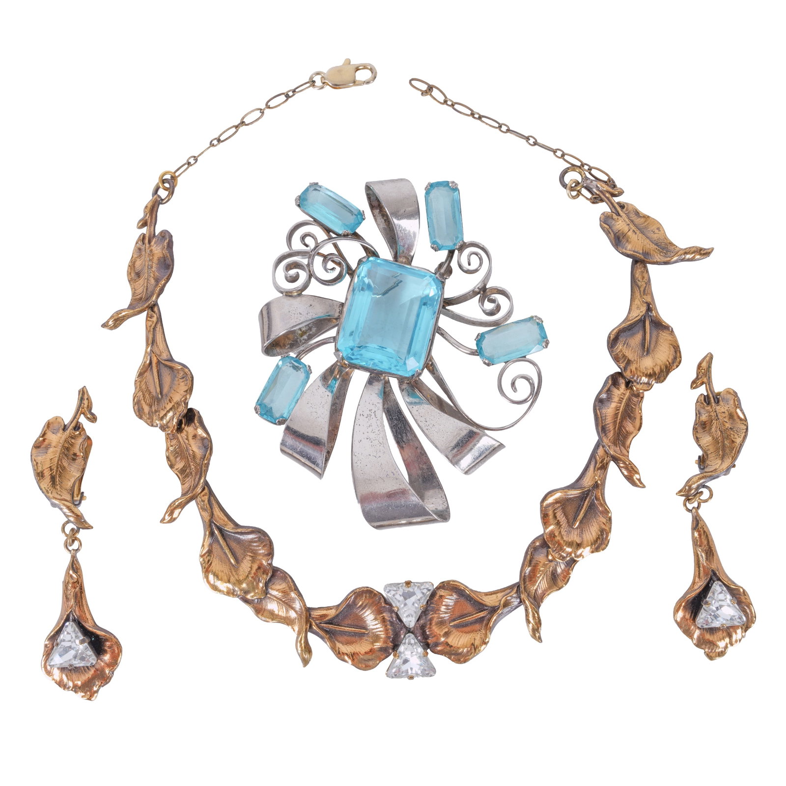 Ermani Bulatti, Netherlands and Joseph Mazer (attr.), America Necklace, earrings and brooch: 20th Century Gilt tone metal, sterling silver, paste insets The earrings stamped 'Ermani Bullati' to clasp The brooch stamped 'Sterling' Necklace 8cm long; earrings 7cm long; brooch