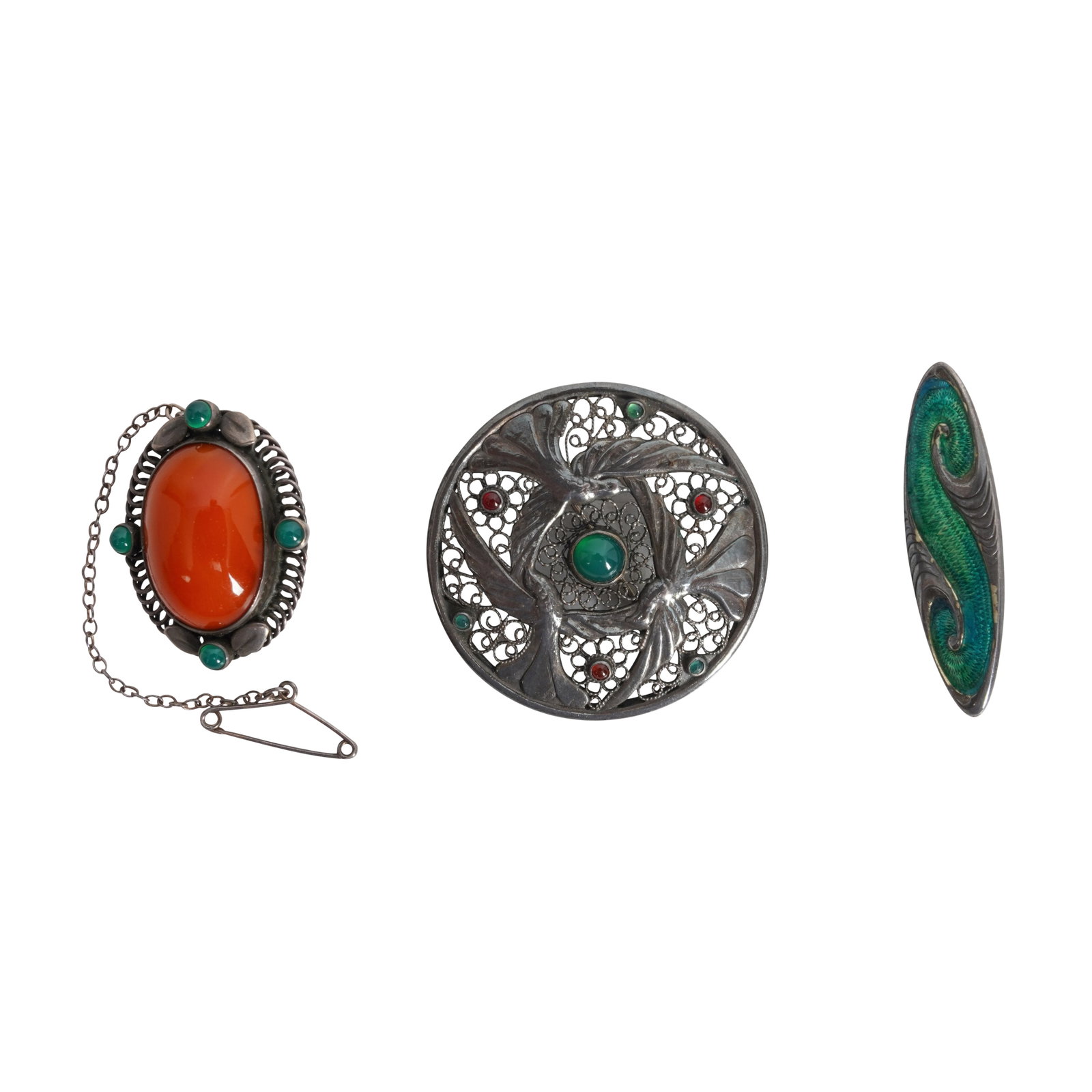 Murrle Bennett (attributed), and others Three brooches: To include a Murrle Bennett style brooch with blue-green enamel, 4cm, an Arts and Crafts style brooch stamped 'GI', '830', '93', approx 3cm x 2cm, and a circular brooch with birds in flight design, 4c