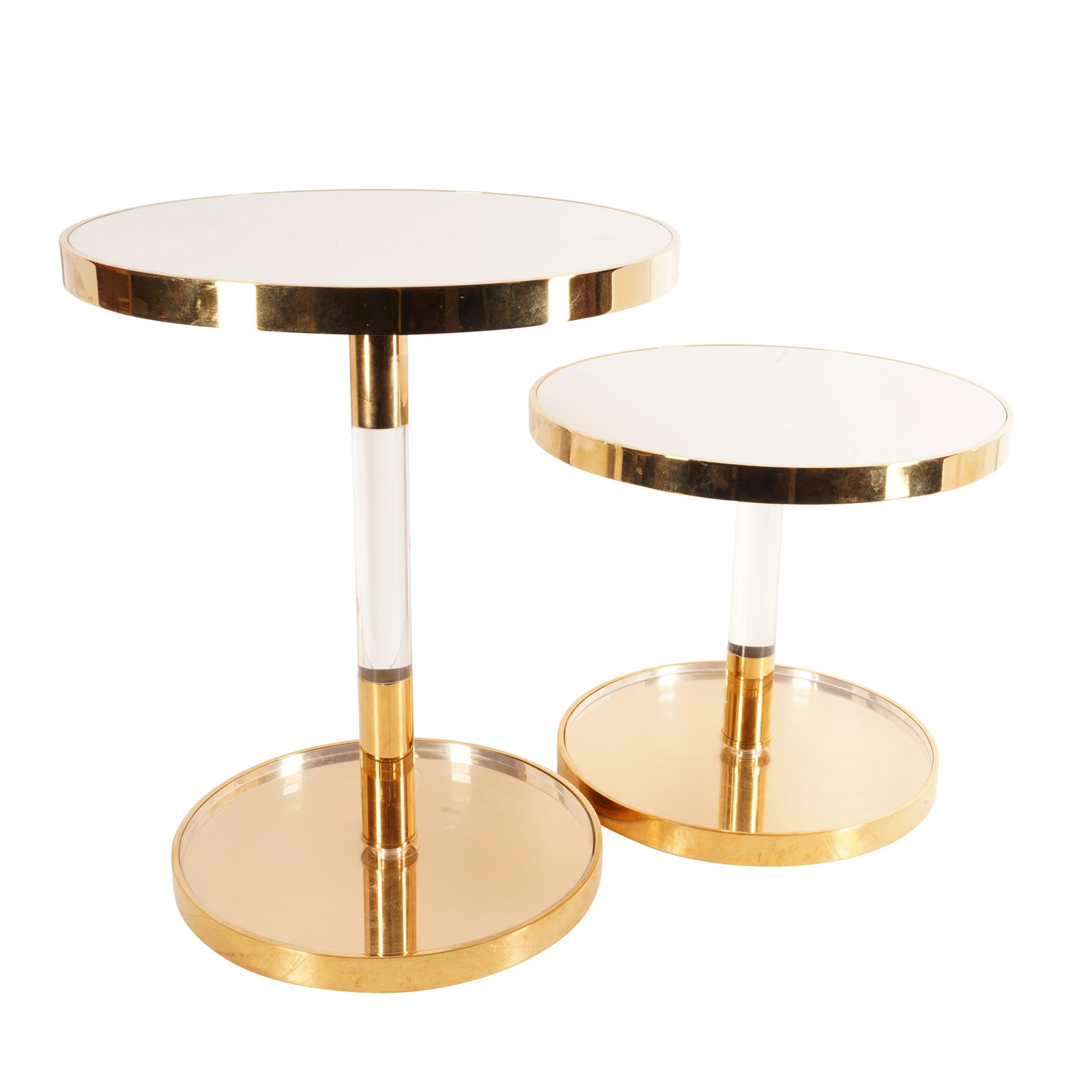 Kate Spade, New York Pair of side tables: Contemporary Lucite, brass Unmarked 31cm high x 35.5cm diameter 45.5cm high x 38cm diameter